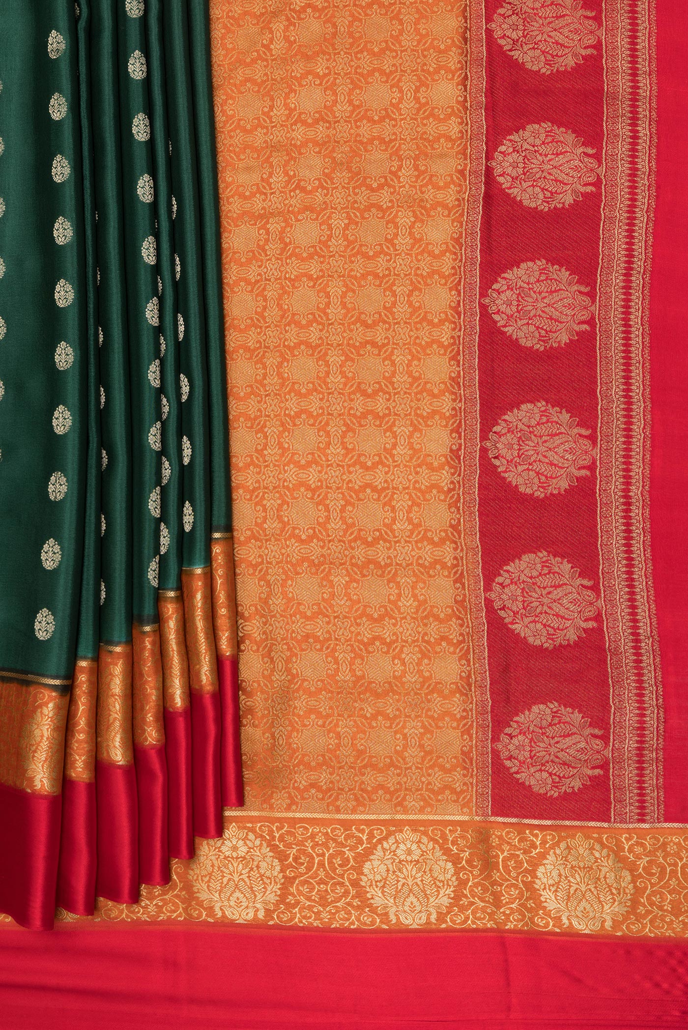 Pleats and pallu of Bottle Green Mysore Silk Saree with Zari Butta on the body and Zari Border. 