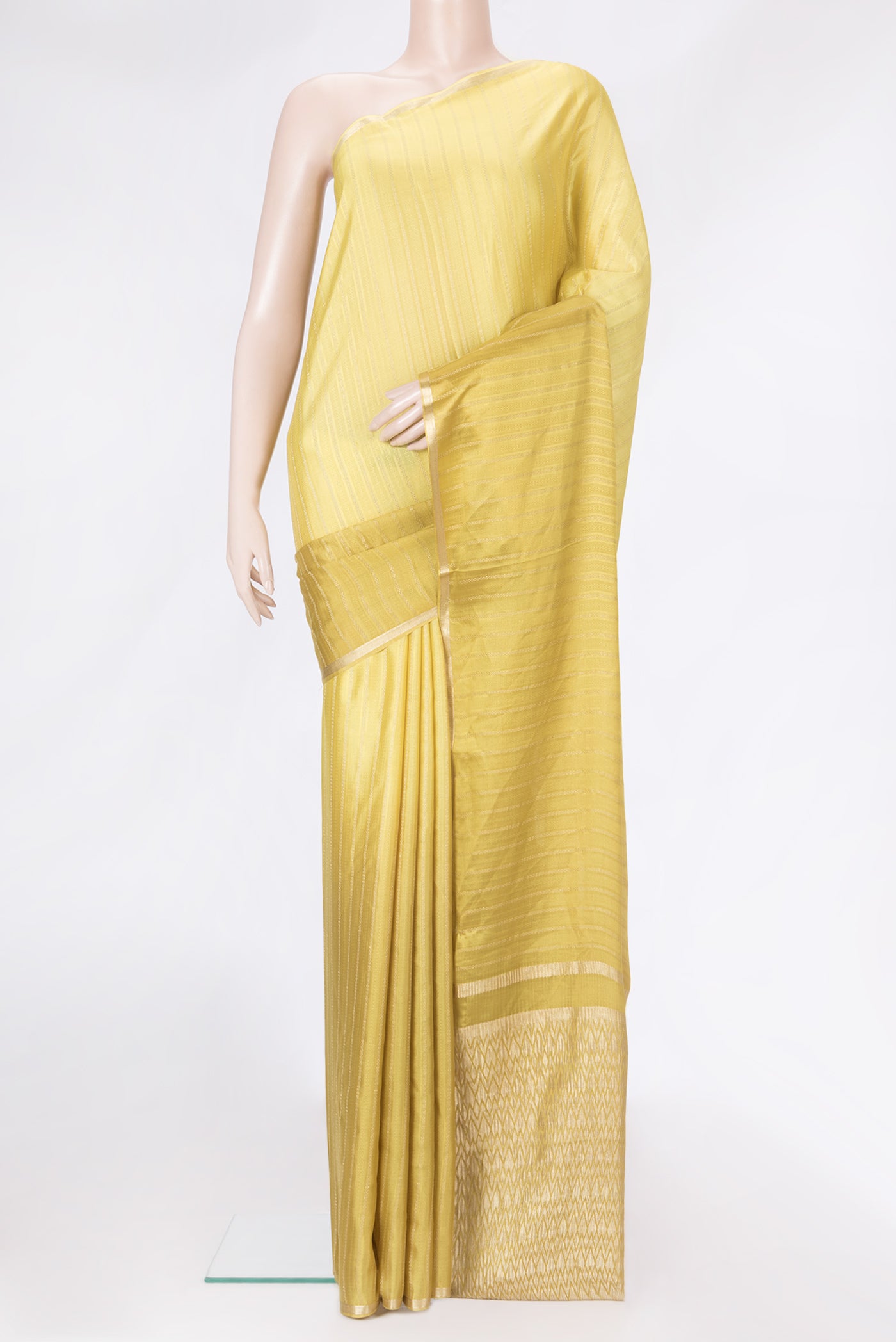 Mehandi Green Dual Tone Mysore Silk Saree with Stripes on the body and Zari Border.  displayed on a mannequin