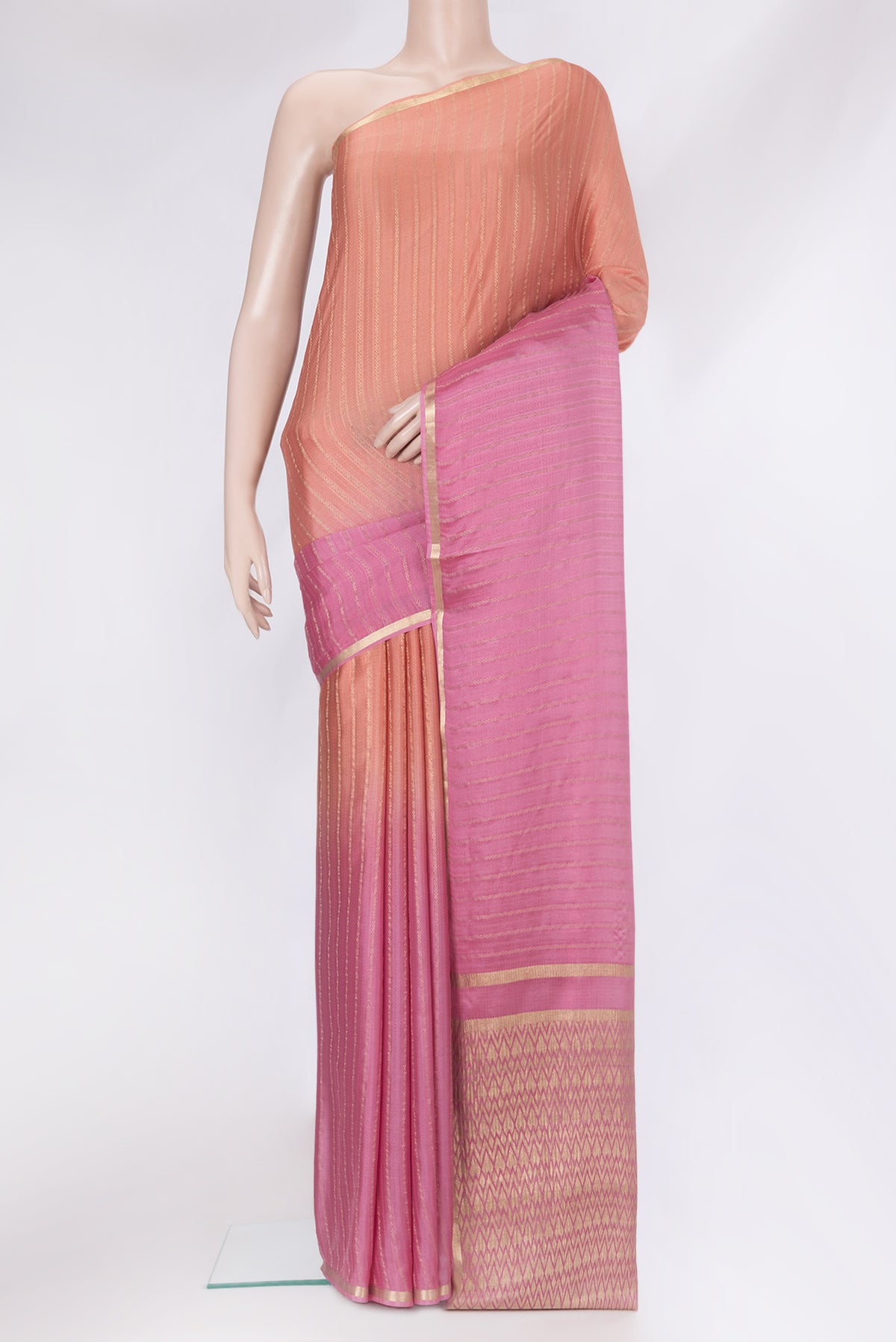 Multi Color Mysore Silk Saree with Stripes on the body and Zari Border.  displayed on a mannequin