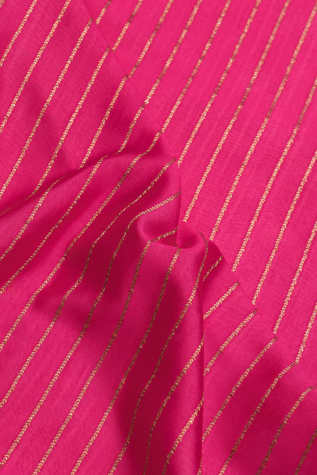 Close up of Pink Dual Tone Mysore Silk Saree with Stripes on the body and Fancy Border.  displaying folds