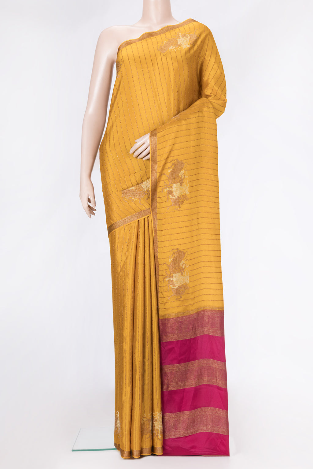 Mustard Dual Tone Mysore Silk Saree with Stripes on the body and Fancy Border.  displayed on a mannequin