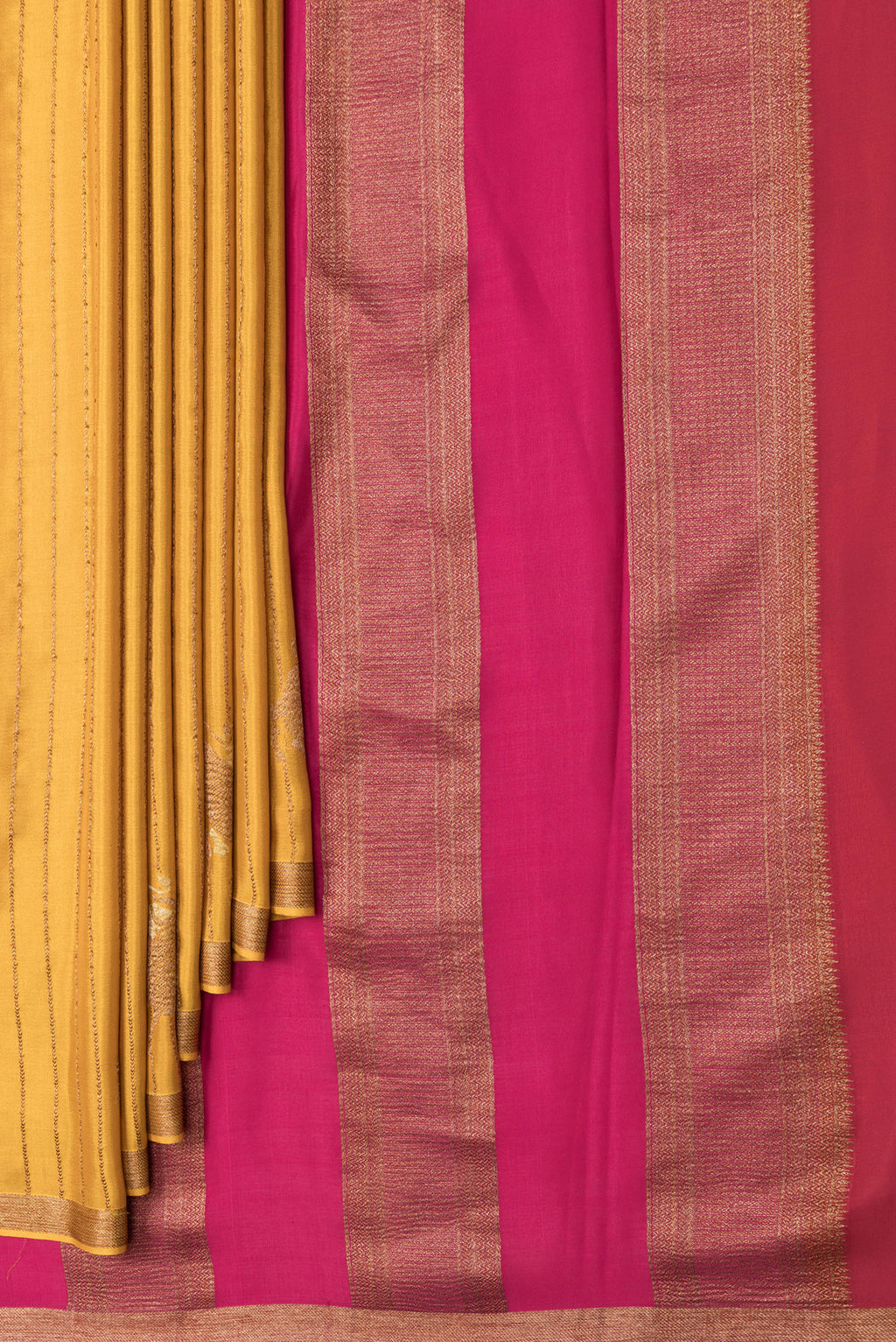 Pleats and pallu of Mustard Dual Tone Mysore Silk Saree with Stripes on the body and Fancy Border. 