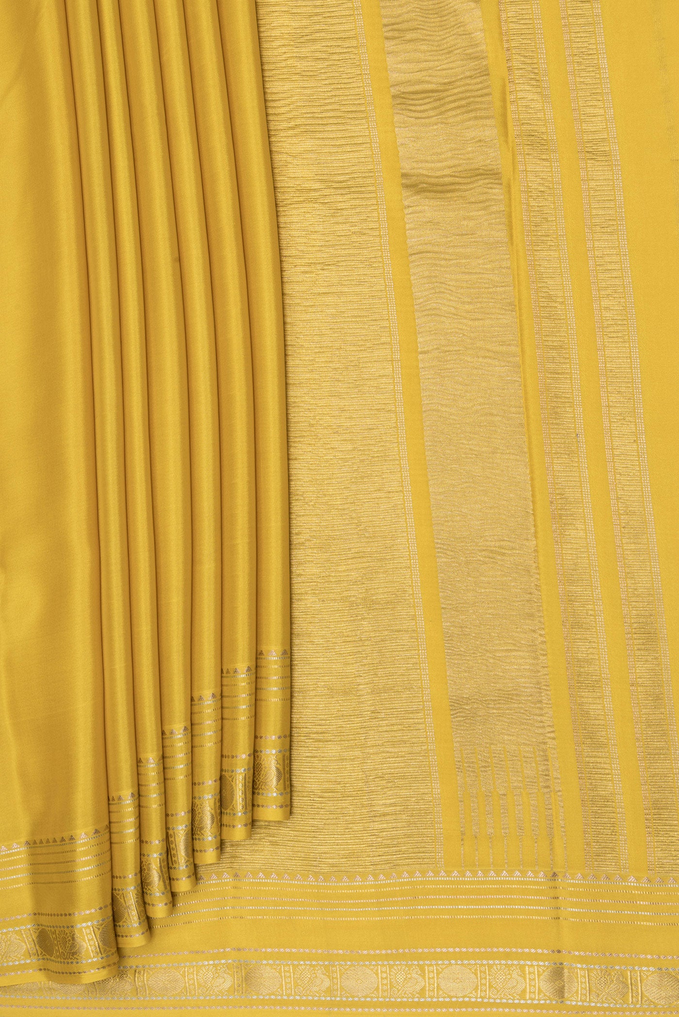 Pleats and pallu of Mustard Mysore Silk Saree with Plain Body and Zari Border. 