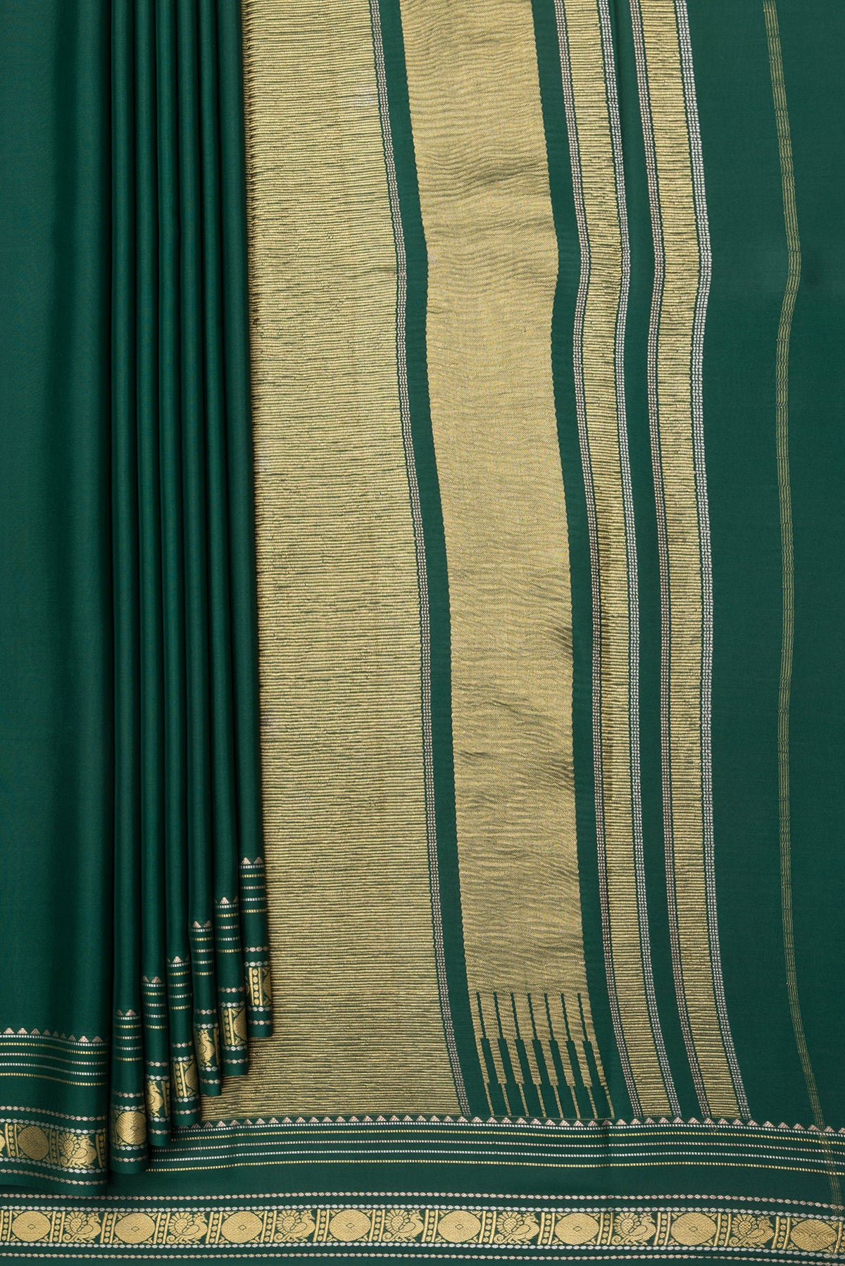 Pleats and pallu of Bottle Green Mysore Silk Saree with Plain Body and Fancy Border. 