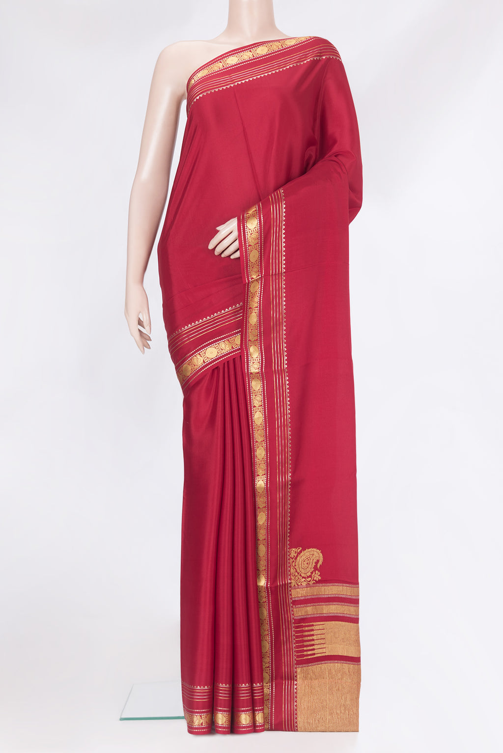 Deep Red Mysore Silk Saree with Plain Body and Zari Border.  displayed on a mannequin