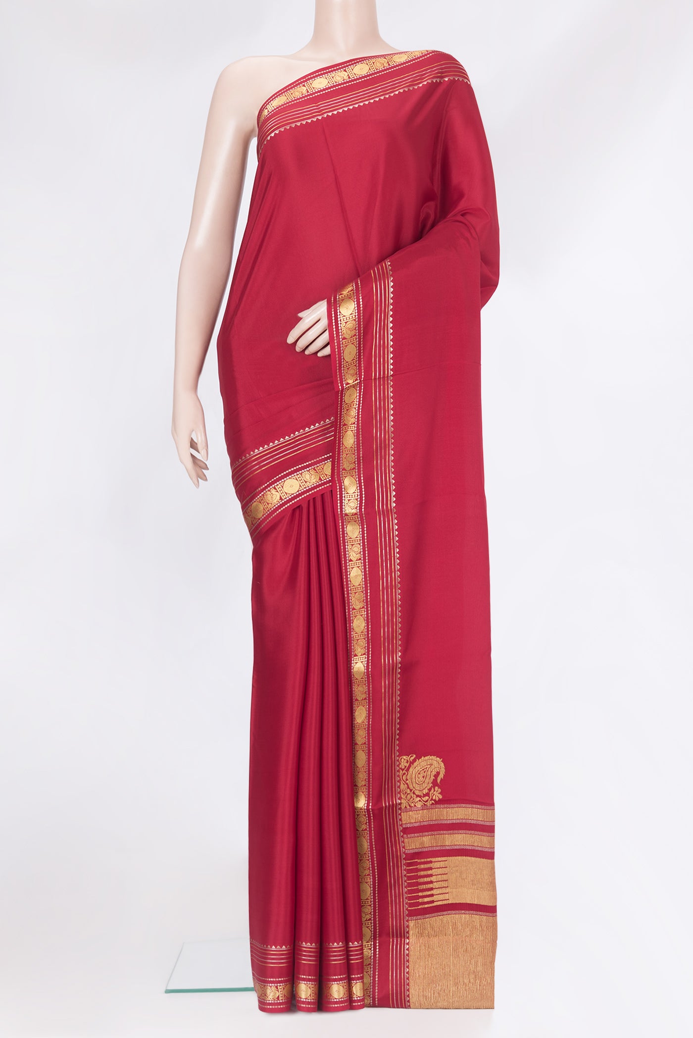 Deep Red Mysore Silk Saree with Plain Body and Zari Border.  displayed on a mannequin