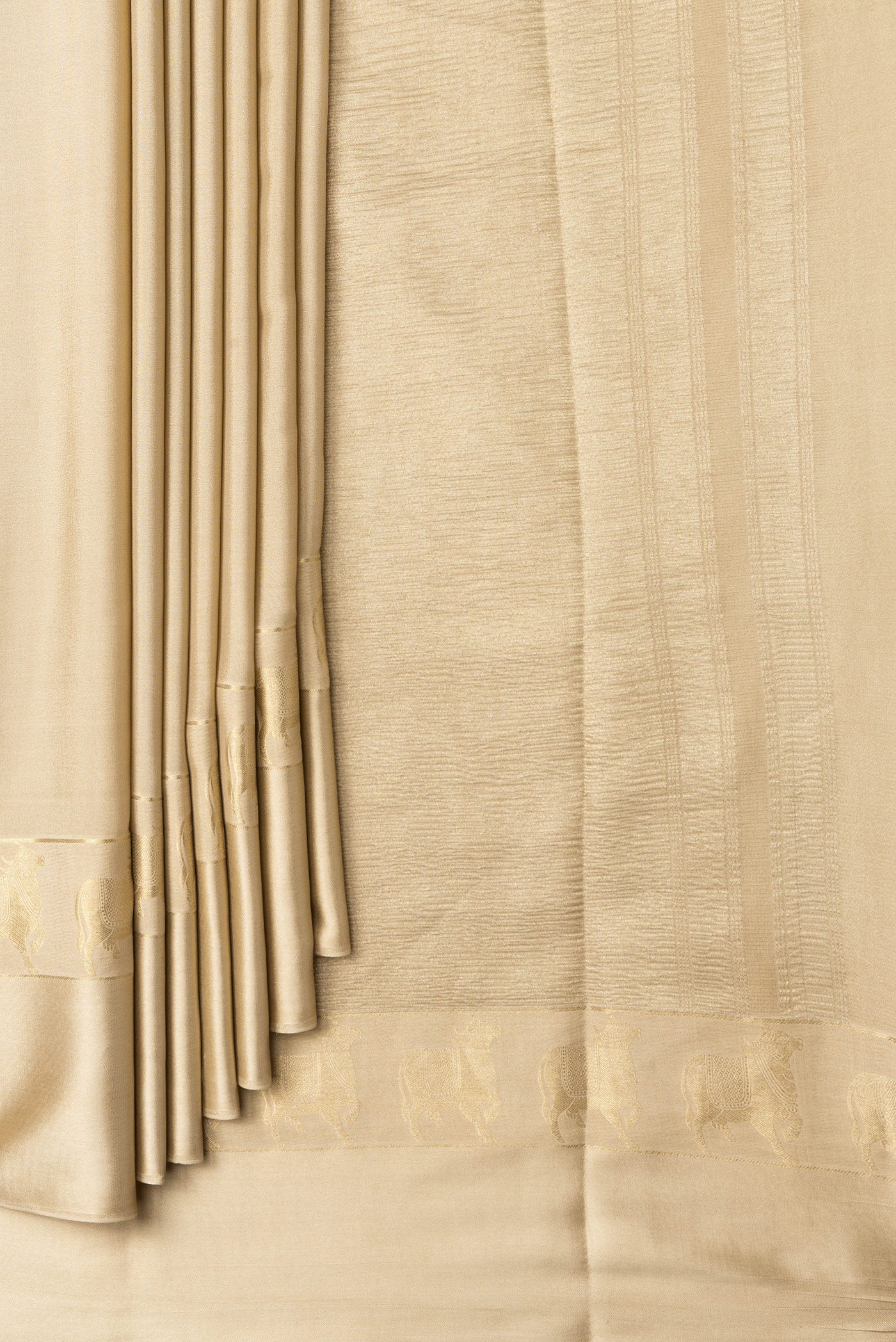 Pleats and pallu of Beige Dual Tone Mysore Silk Saree with Plain Body and Fancy Border. 