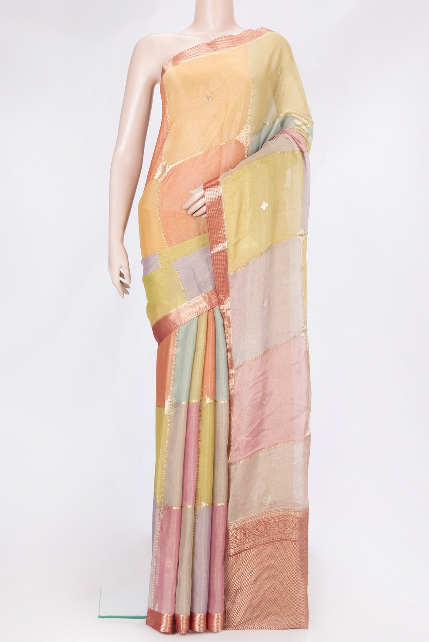 Yellow, Pink and Lavender Color Georgette Saree with Zari Brocade on the body and Zari Border.  displayed on a mannequin