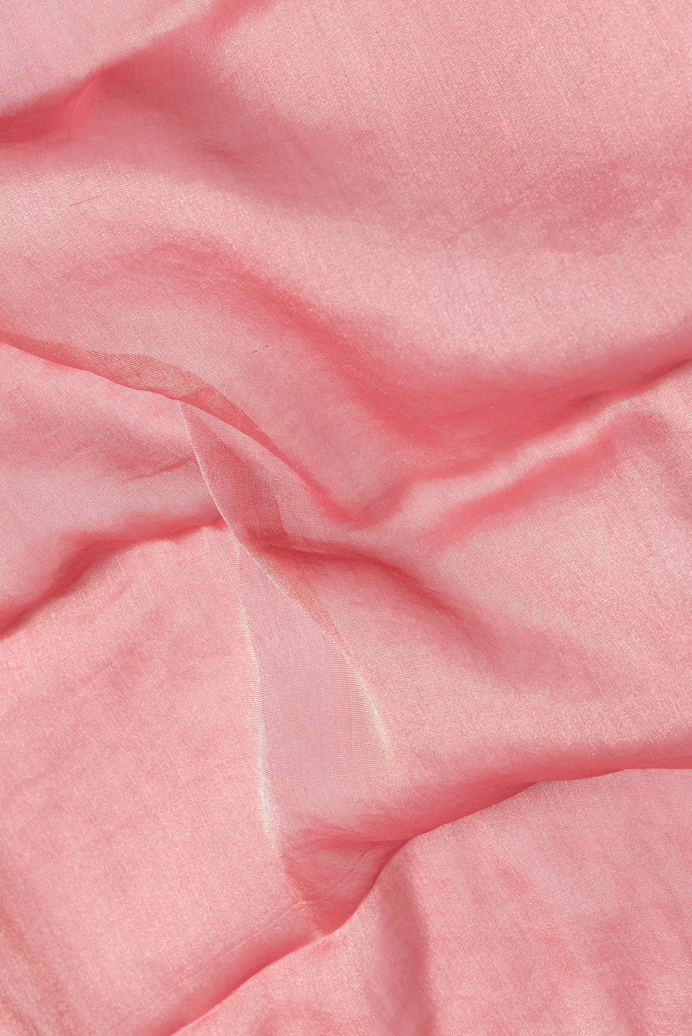 Close up of Pink Dual Tone Georgette Saree with Plain Body and Checks Border.  displaying folds