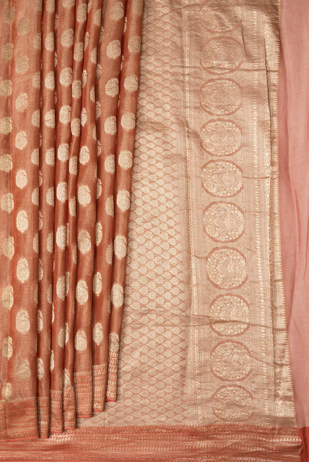 Pleats and pallu of Brick Orange Dual Tone Mysore Georgette Saree with Zari Brocade on the body and Zari Border. 