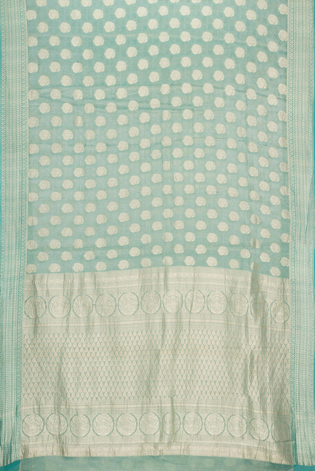 Flat view of Sea Green Dual Tone Mysore Georgette Saree with Zari Brocade on the body and Zari Border. 