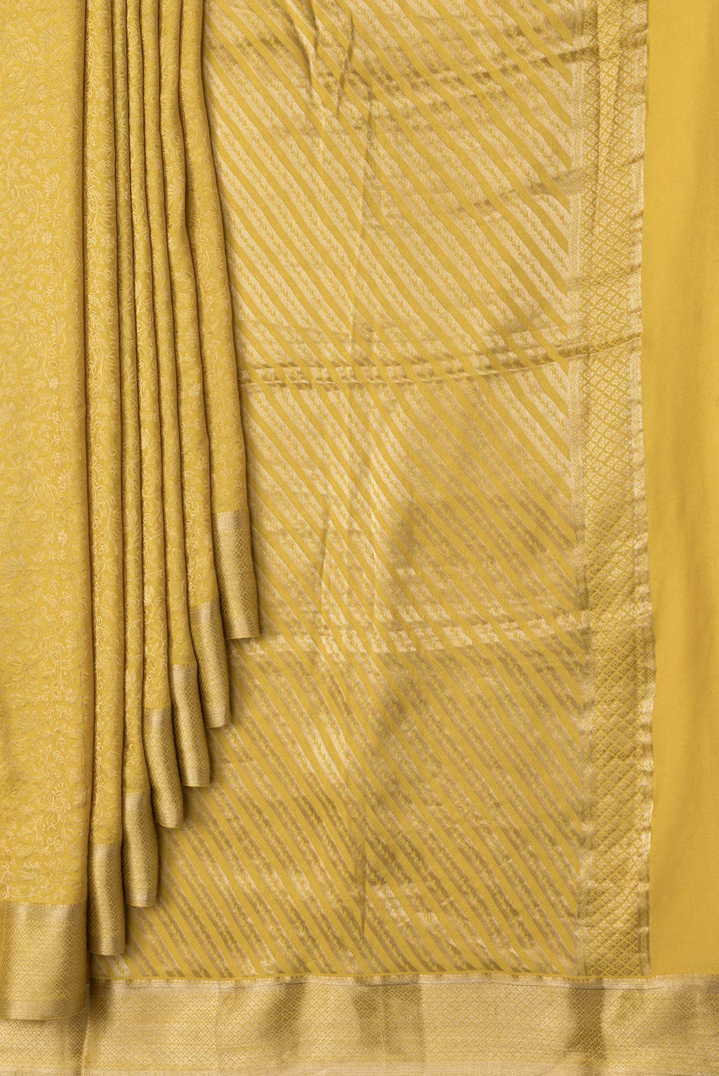 Pleats and pallu of Yellow Dual Tone Georgette Saree with Zari Brocade on the body and Zari Border. 