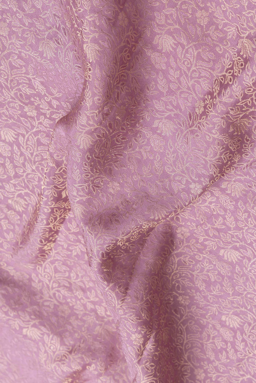 Close up of Purple Dual Tone Georgette Saree with Zari Brocade on the body and Zari Border.  displaying folds