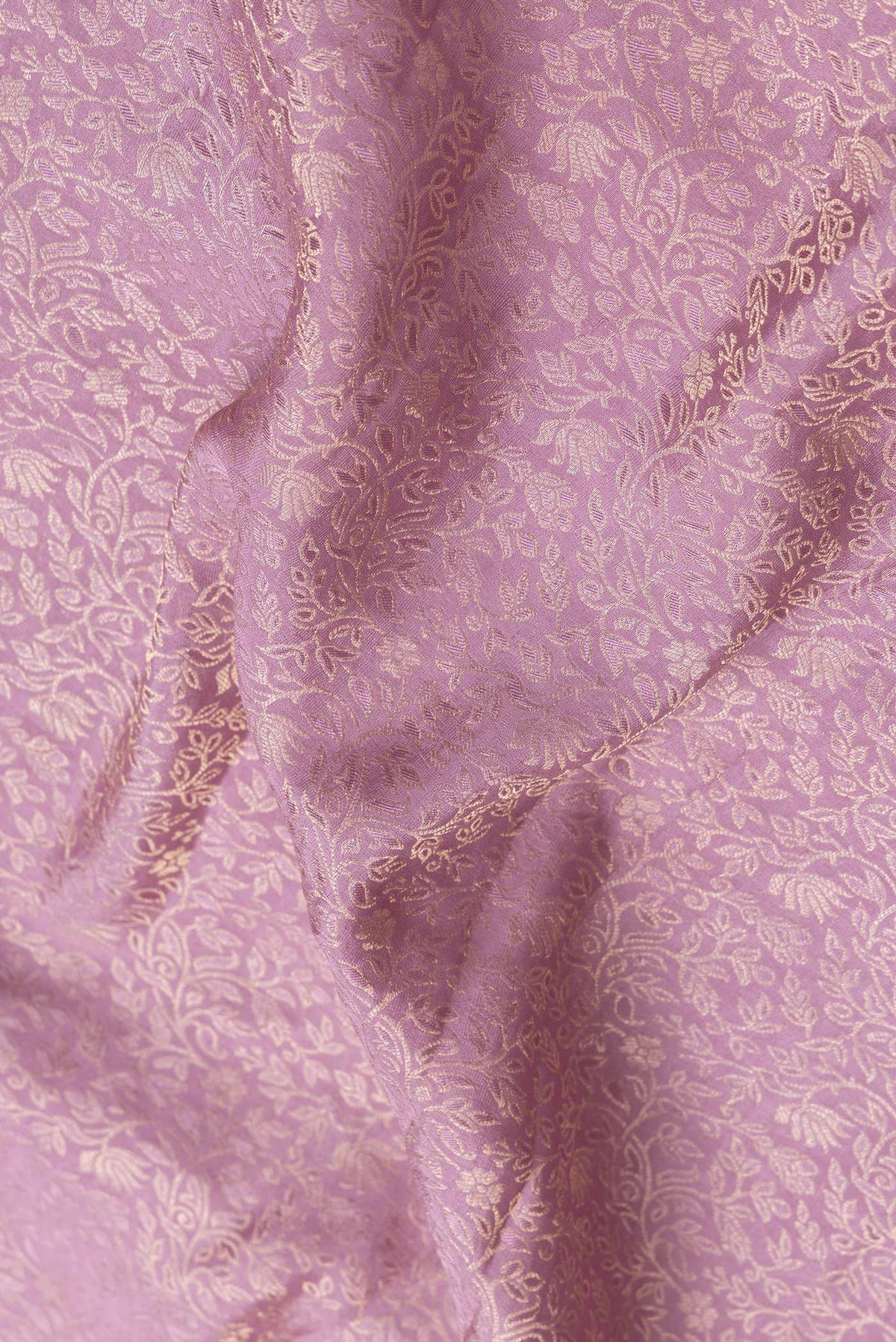 Close up of Purple Dual Tone Georgette Saree with Zari Brocade on the body and Zari Border.  displaying folds