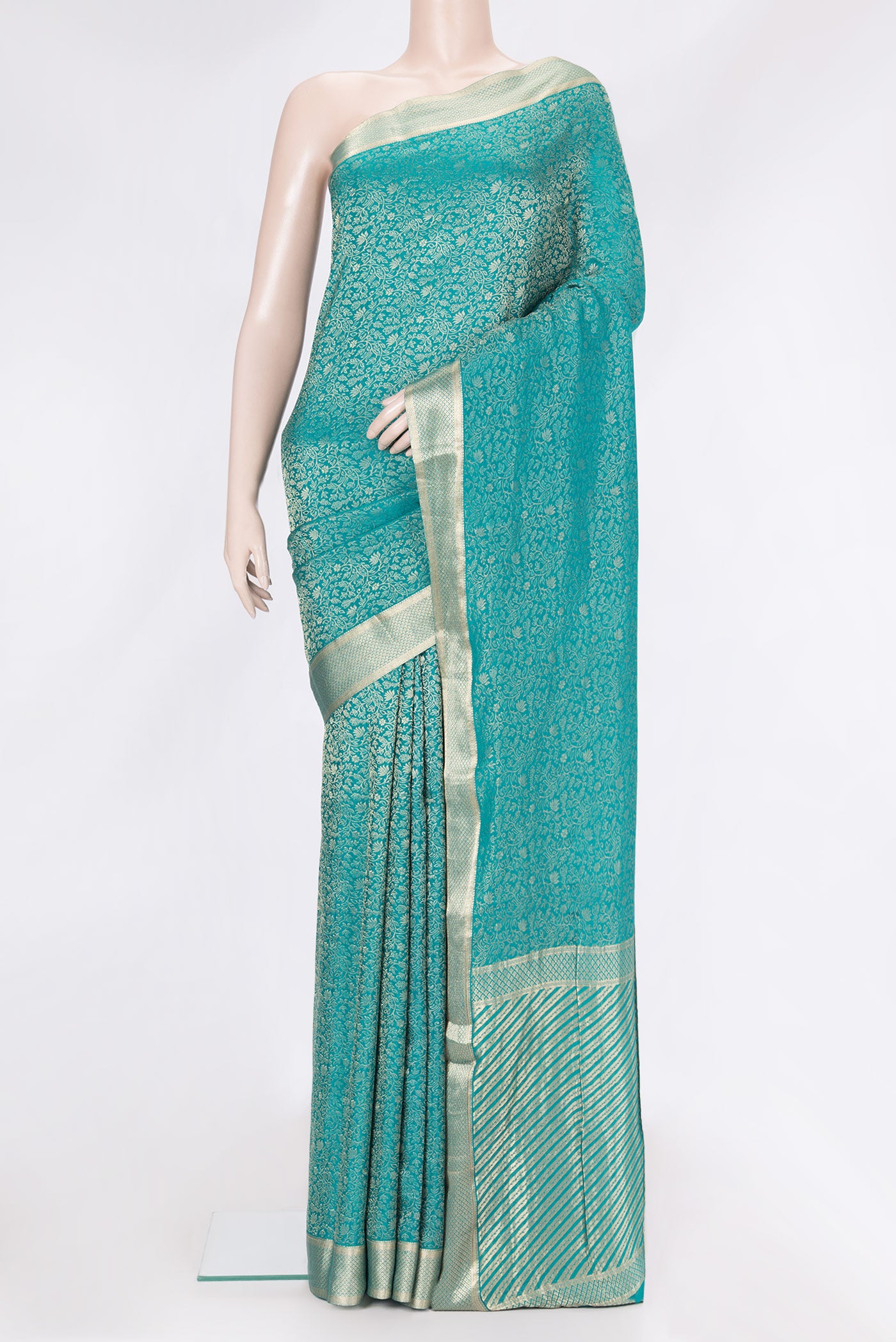 Sky Blue Dual Tone Georgette Saree with Zari Brocade on the body and Zari Border.  displayed on a mannequin