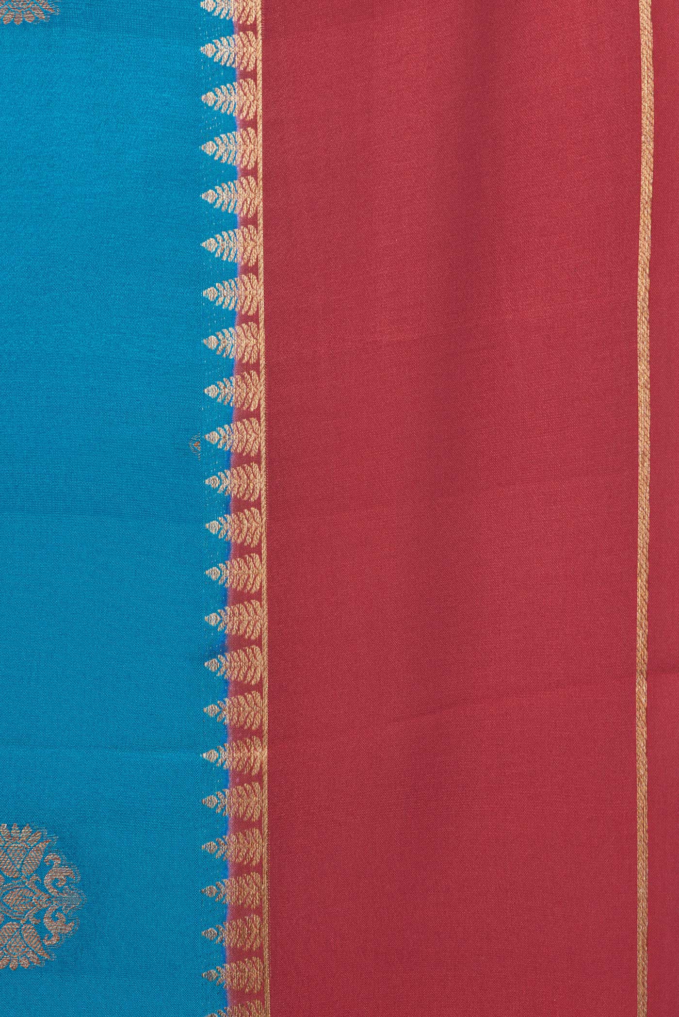 Border image of Sky Blue Dual Tone Mysore Silk Saree with Zari Butta on the body and Zari Border. 