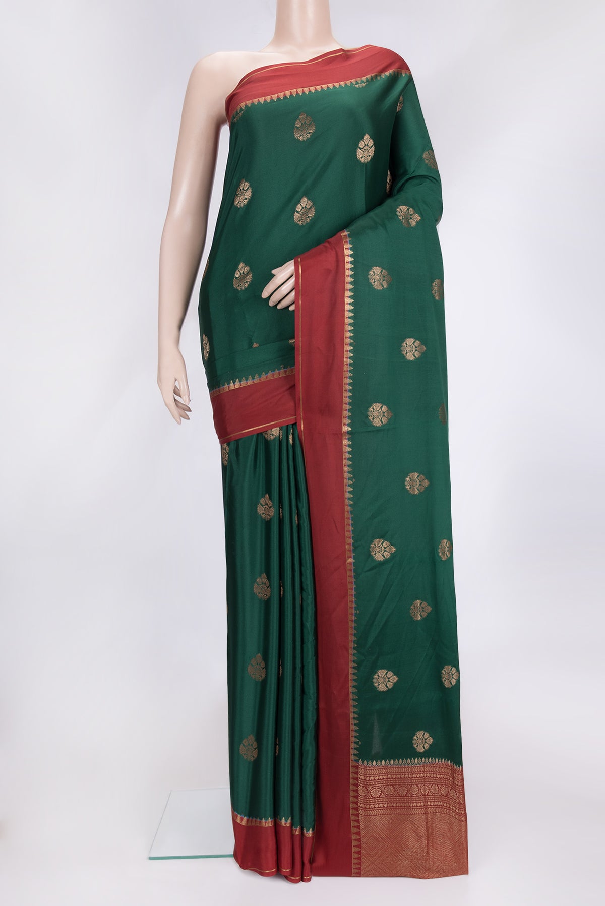Bottle Green Dual Tone Mysore Silk Saree with Zari Butta on the body and Zari Border.  displayed on a mannequin