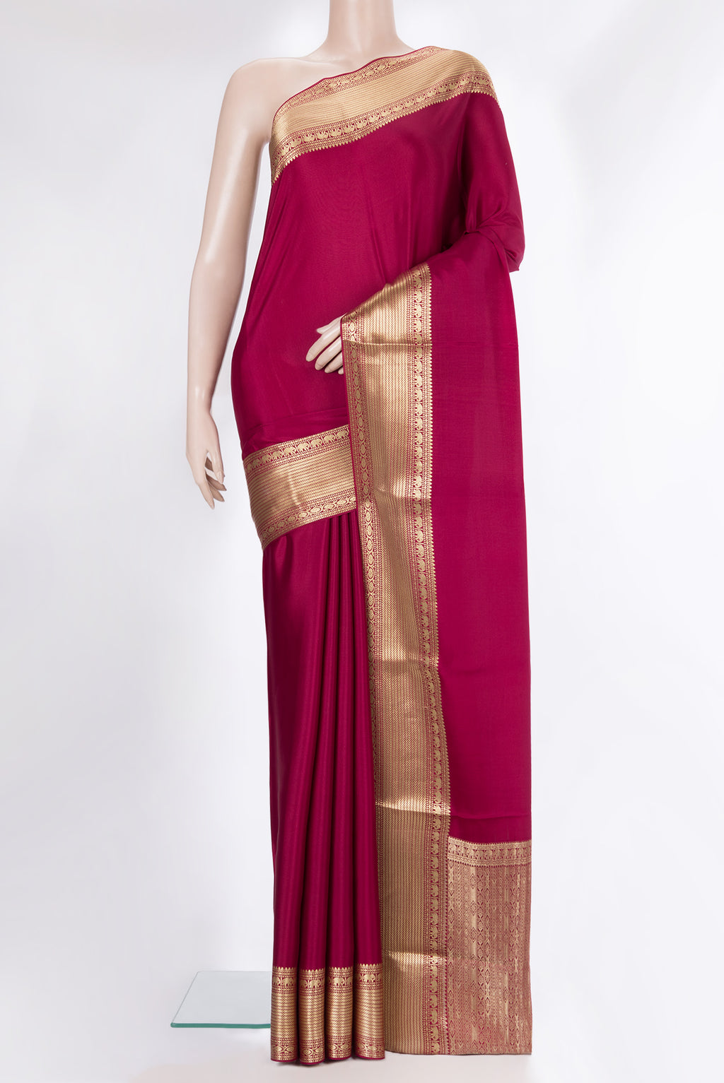 Pure Silk Dark Pink Mysore Crepe Saree with Plain Body and Zari Border.  displayed on a mannequin