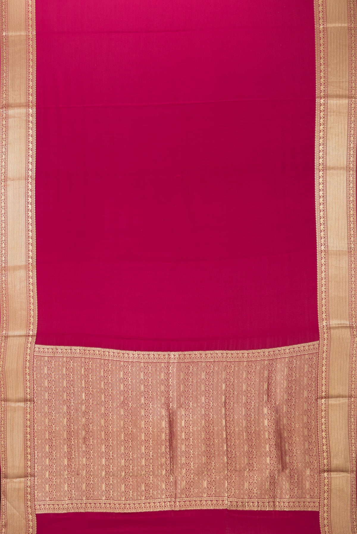Flat view of Pure Silk Dark Pink Mysore Crepe Saree with Plain Body and Zari Border. 
