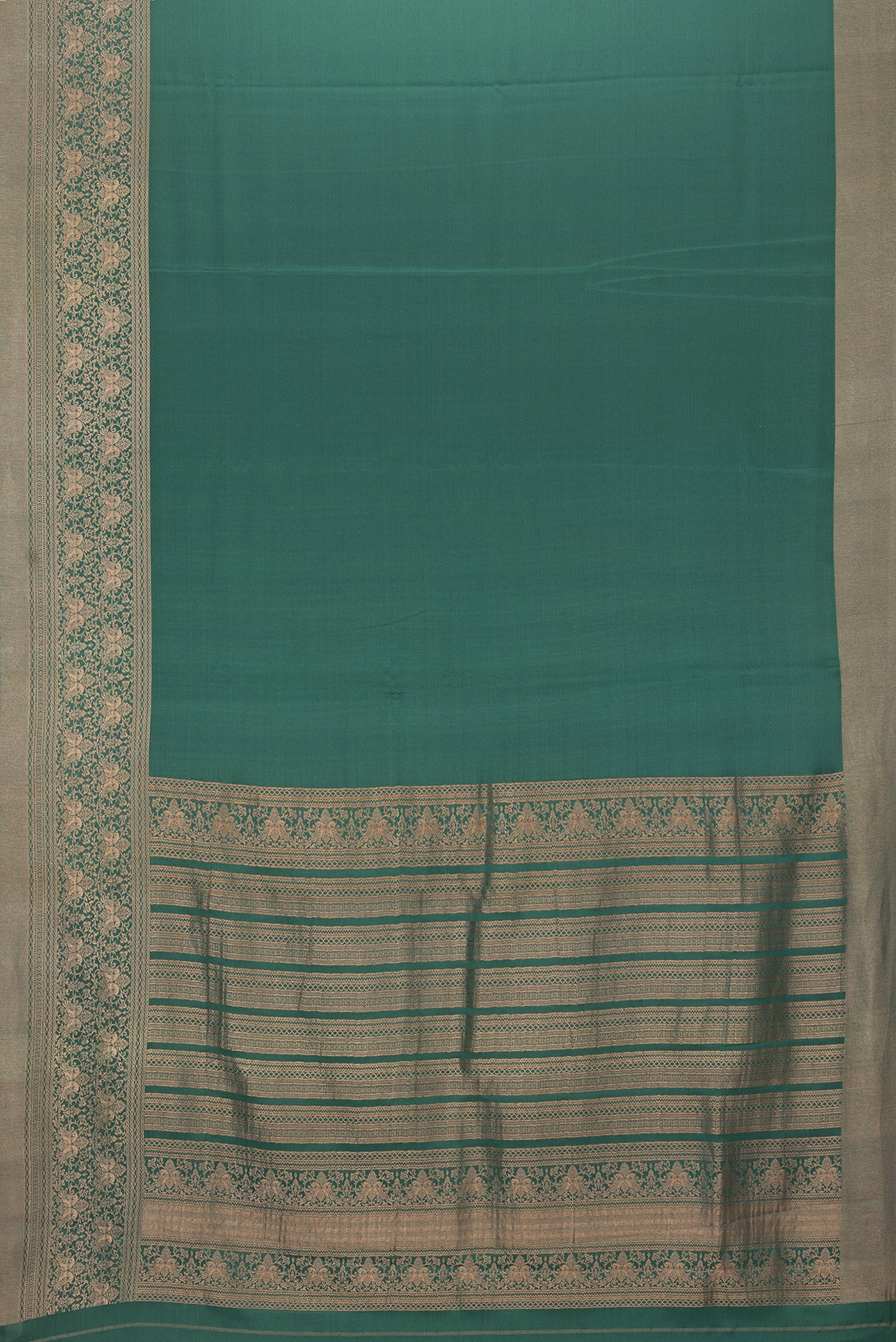 Flat view of Bottle Green Mysore Silk Saree with Plain Body and Zari Border. 