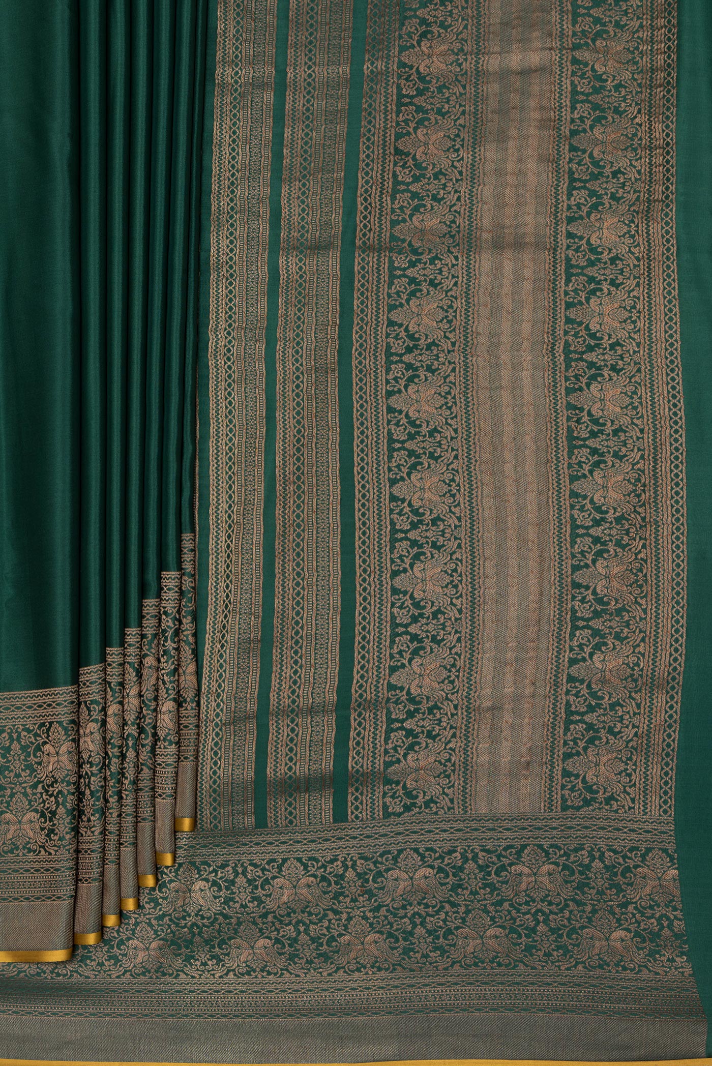 Pleats and pallu of Bottle Green Mysore Silk Saree with Plain Body and Zari Border. 