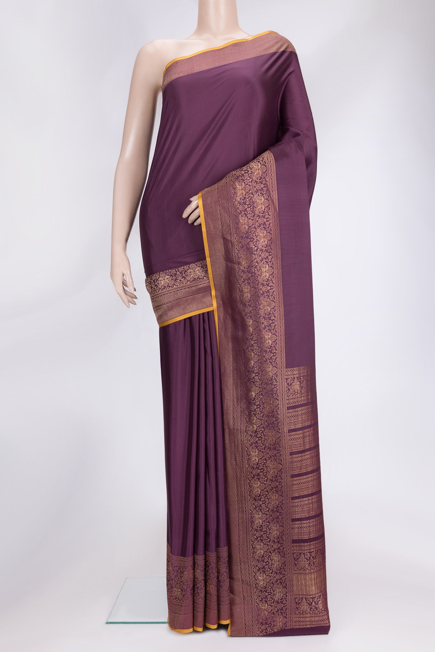 Burgundy Dual Tone Mysore Silk Saree with Plain Body and Zari Border.  displayed on a mannequin