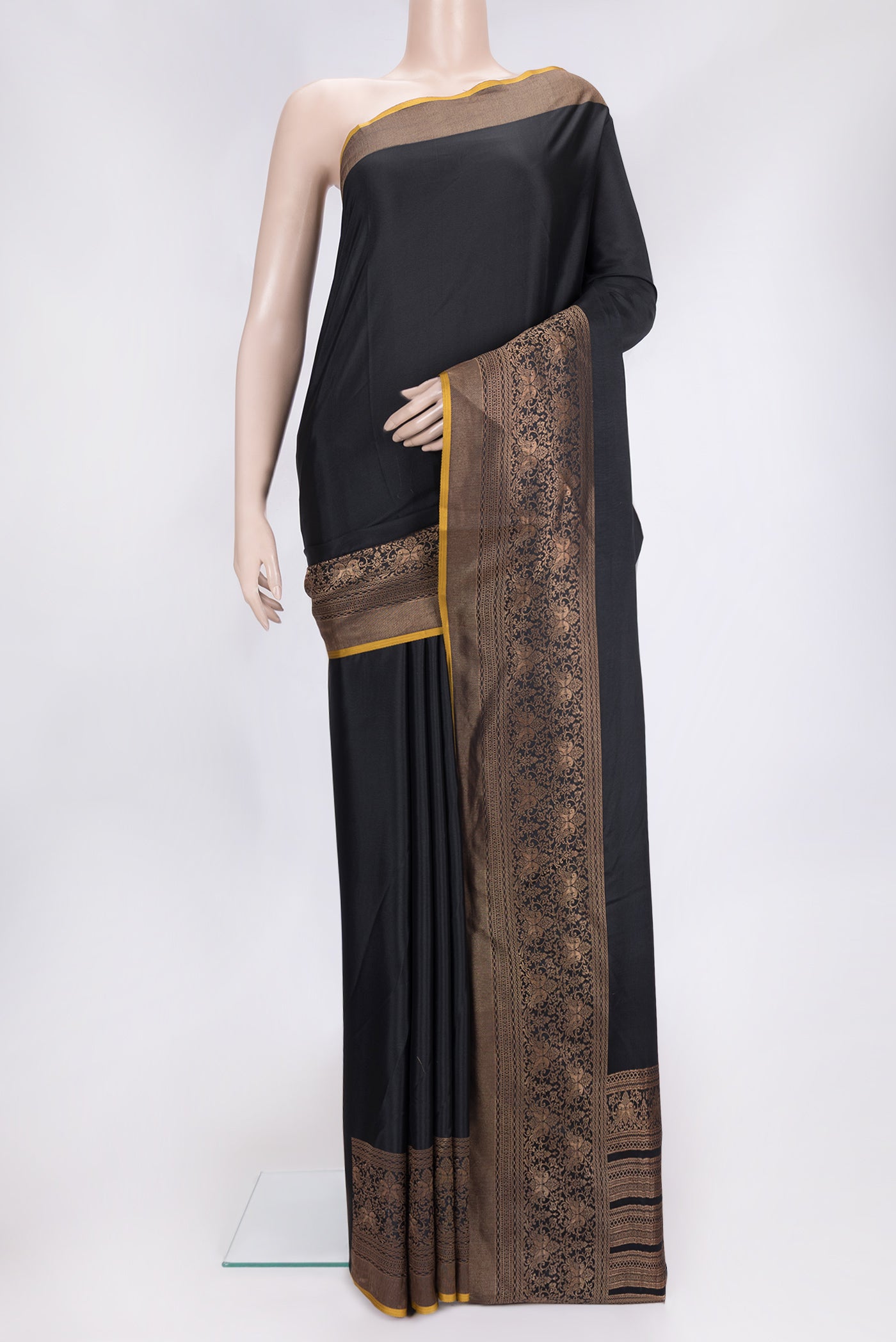 Black Dual Tone Mysore Silk Saree with Zari Butta on the body and Zari Border.  displayed on a mannequin