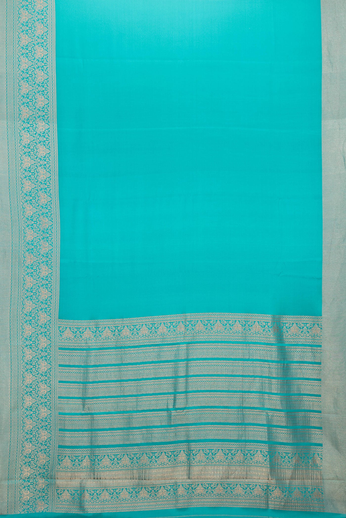Flat view of Sky Blue Dual Tone Mysore Silk Saree with Plain Body and Zari Border. 