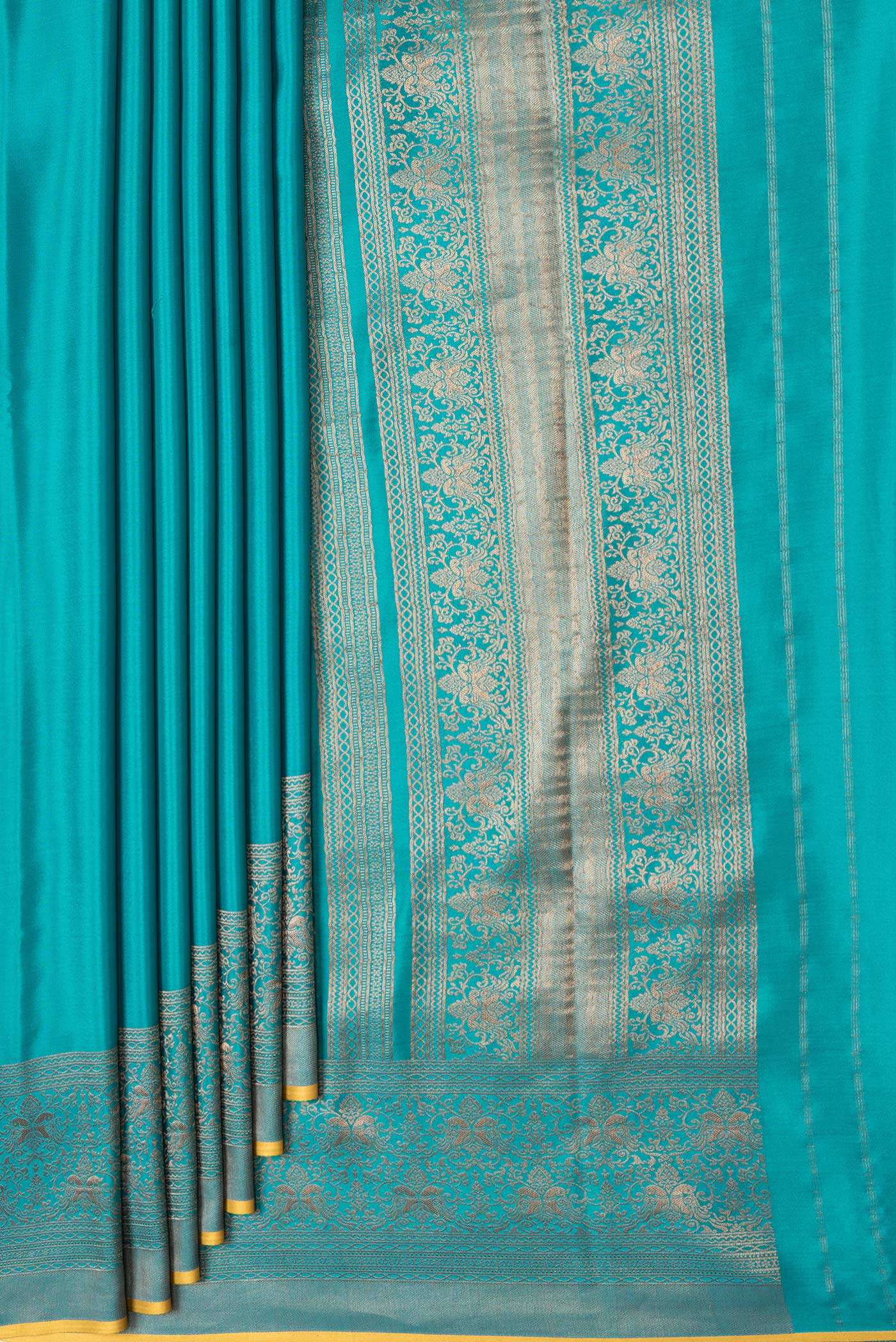 Pleats and pallu of Sky Blue Dual Tone Mysore Silk Saree with Plain Body and Zari Border. 