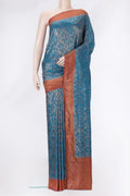 Peacock Blue Mysore Crepe Saree with Zari Brocade on the body and Zari Border.  displayed on a mannequin