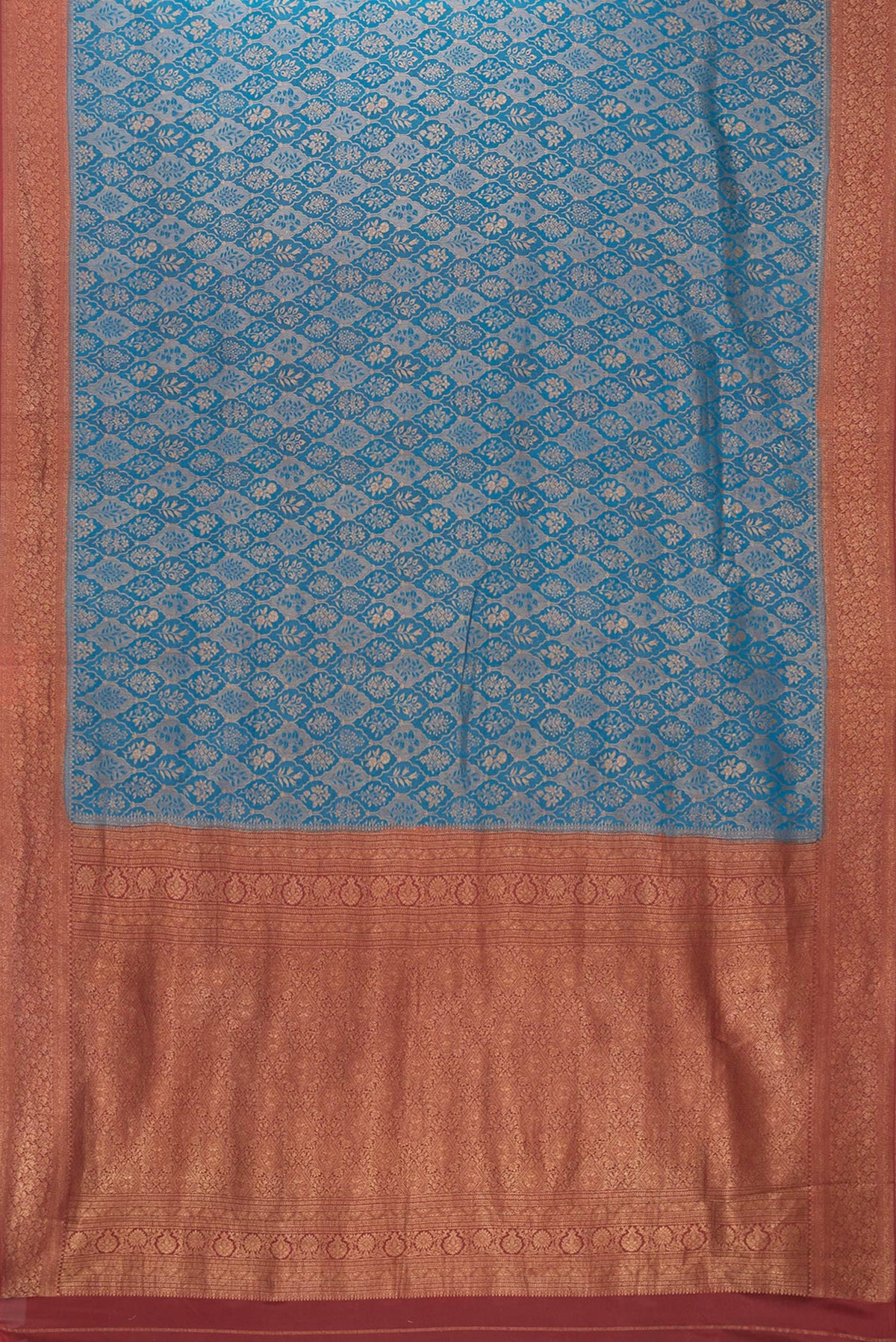 Flat view of Peacock Blue Mysore Crepe Saree with Zari Brocade on the body and Zari Border. 