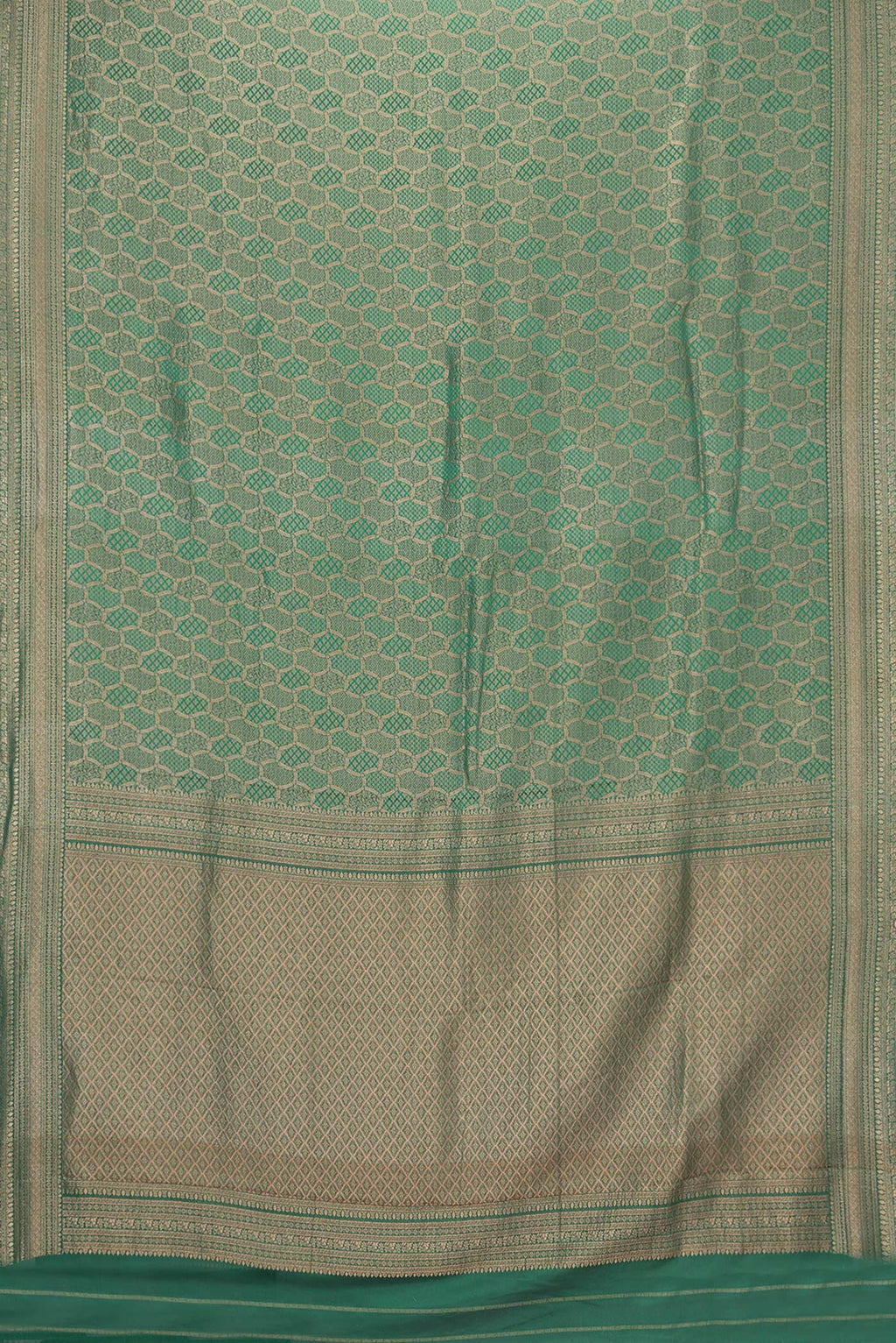 Flat view of Bottle Green Dual Tone Georgette Saree with Zari Brocade on the body and Zari Border. 