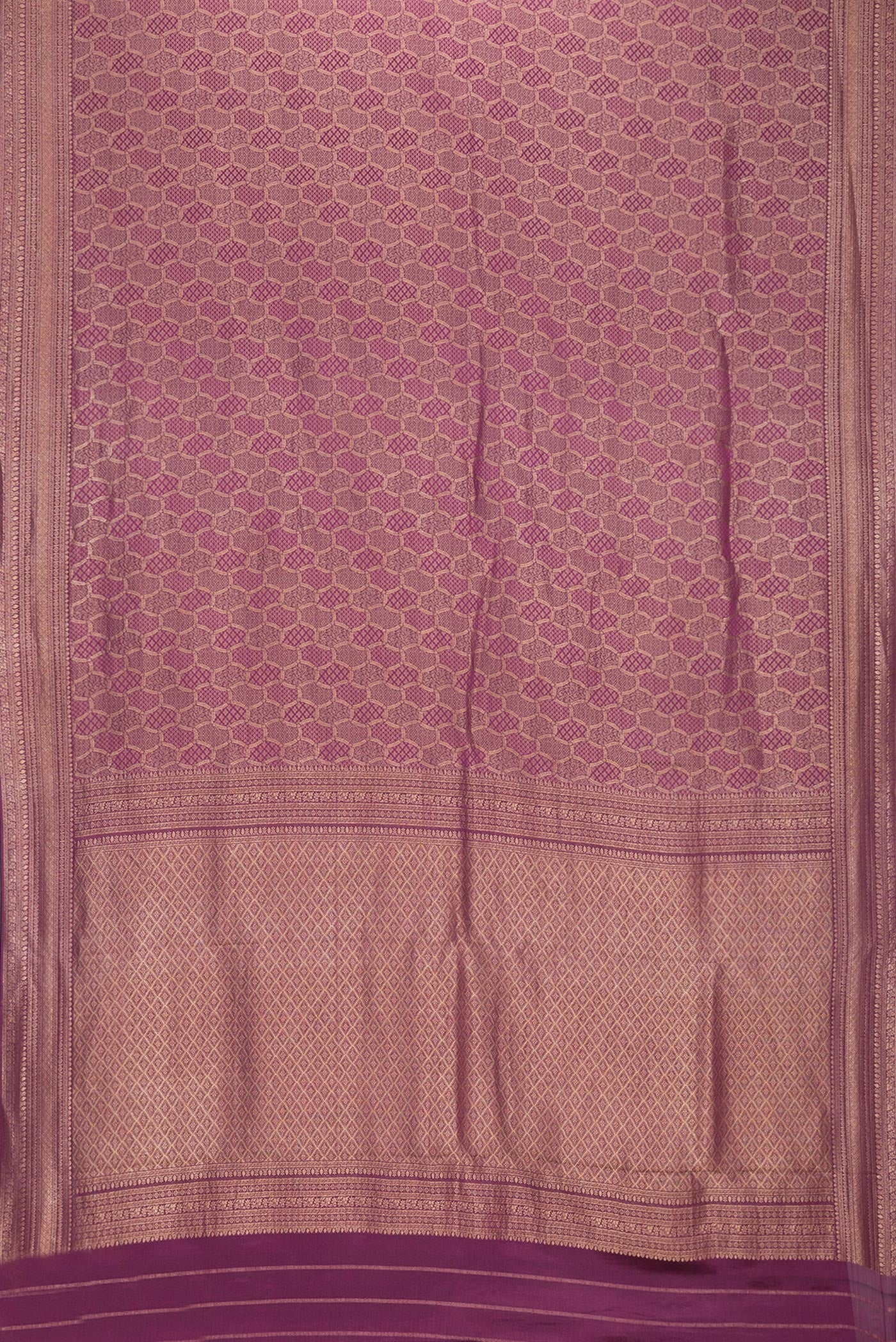 Flat view of Purple Dual Tone Mysore Georgette Saree with Zari Brocade on the body and Zari Border. 