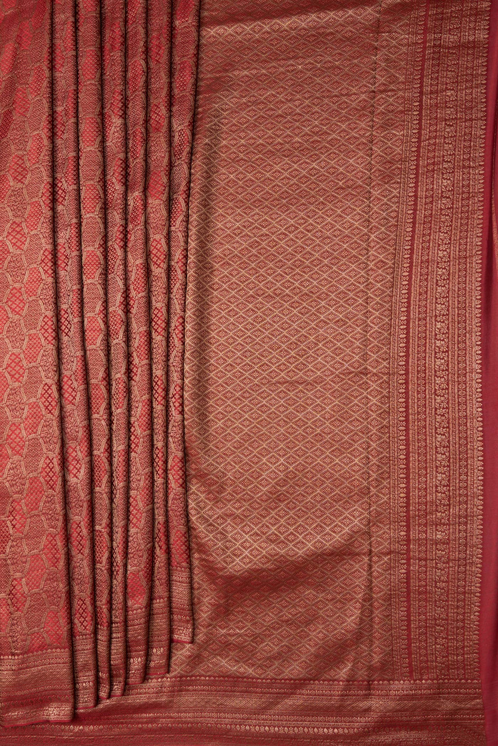 Pleats and pallu of Maroon Dual Tone Mysore Georgette Saree with Zari Brocade on the body and Zari Border. 