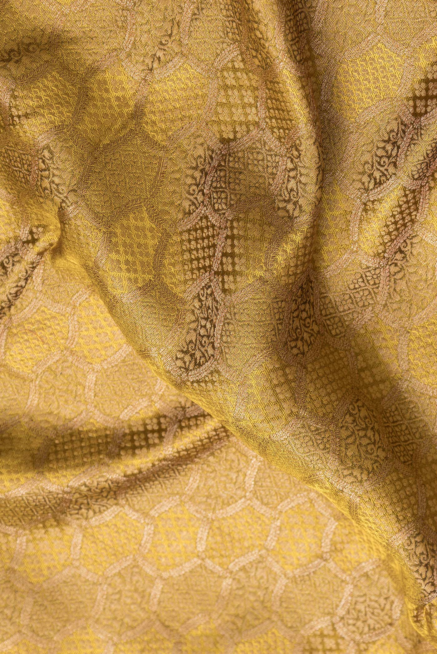 Close up of Mehandi Green Dual Tone Mysore Georgette Saree with Zari Brocade on the body and Zari Border.  displaying folds
