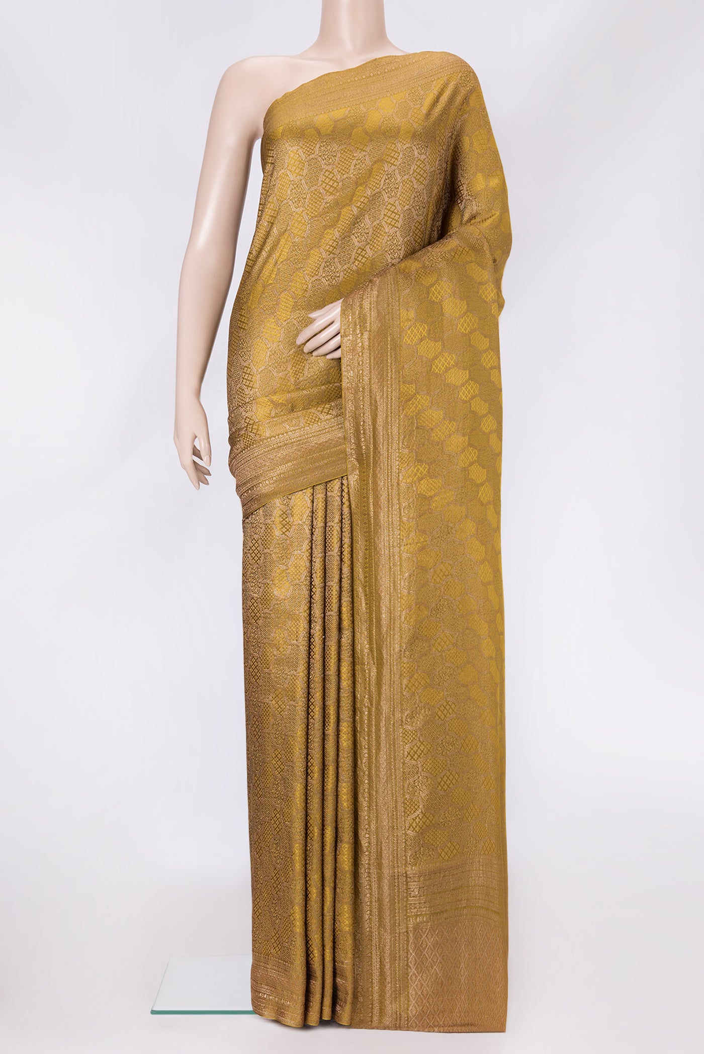 Mehandi Green Dual Tone Mysore Georgette Saree with Zari Brocade on the body and Zari Border.  displayed on a mannequin