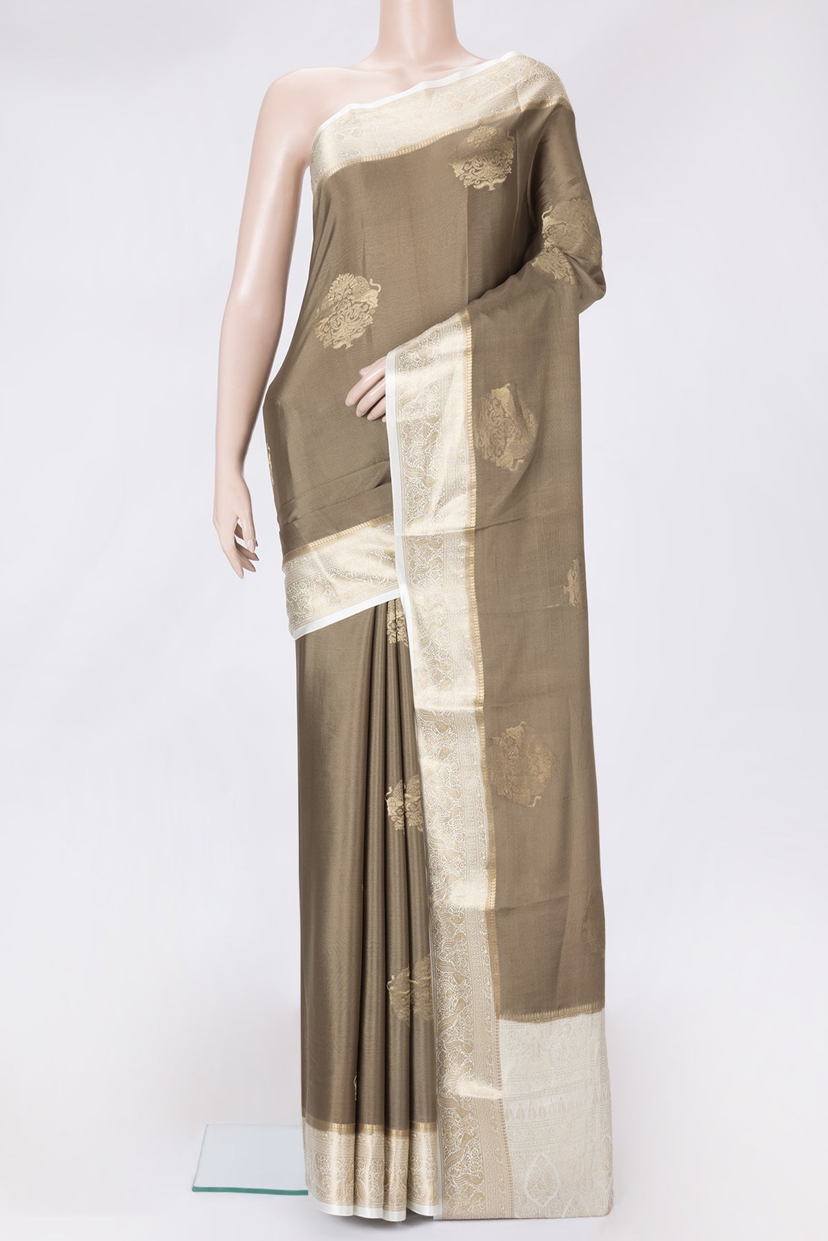 Mehandi Green Dual Tone Mysore Silk Saree with Zari Butta on the body and Zari Border.  displayed on a mannequin