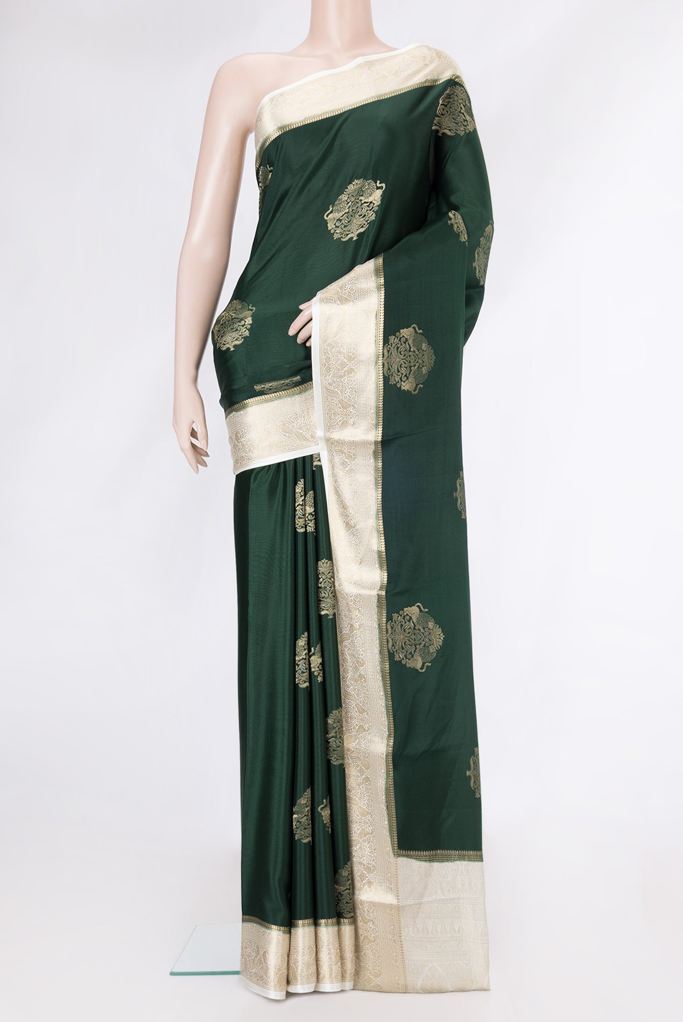 Bottle Green Dual Tone Mysore Silk Saree with Zari Butta on the body and Zari Border.  displayed on a mannequin