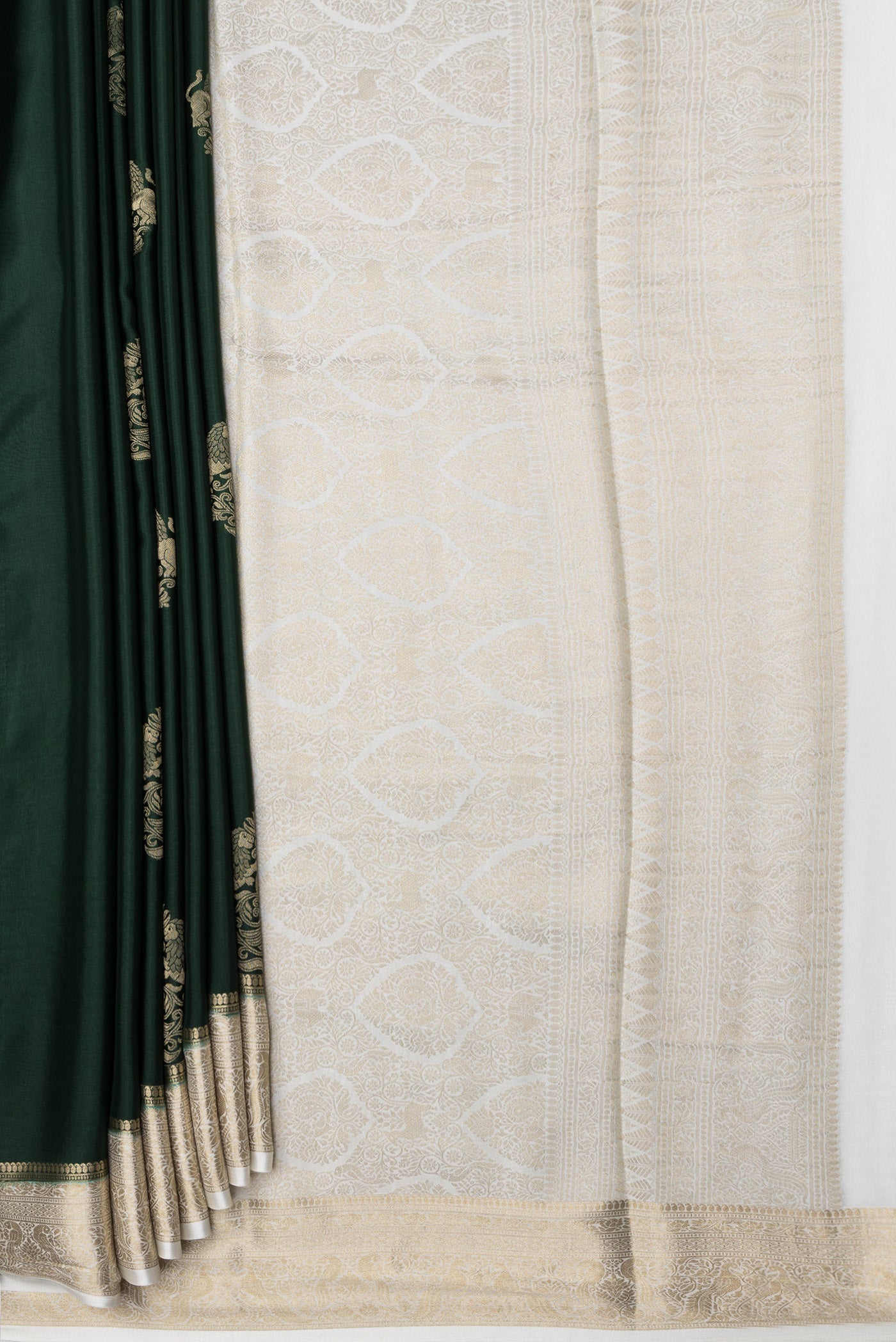 Pleats and pallu of Bottle Green Dual Tone Mysore Silk Saree with Zari Butta on the body and Zari Border. 