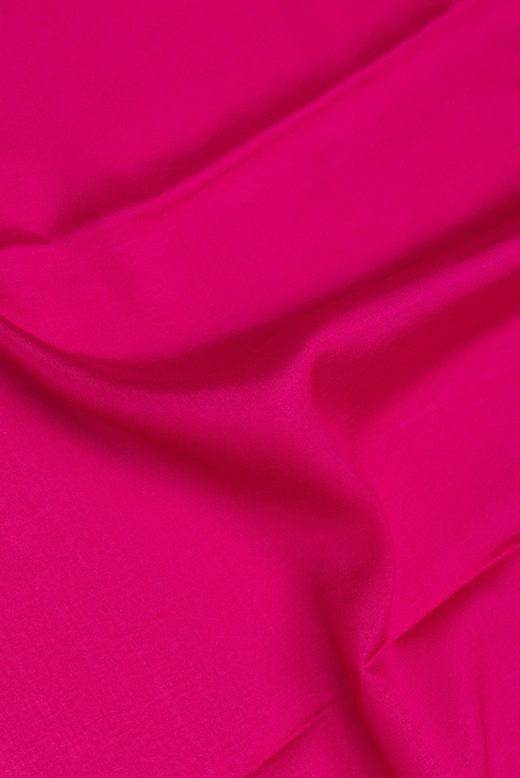Close up of Pink Mysore Silk Saree with Plain Body and Fancy Border.  displaying folds