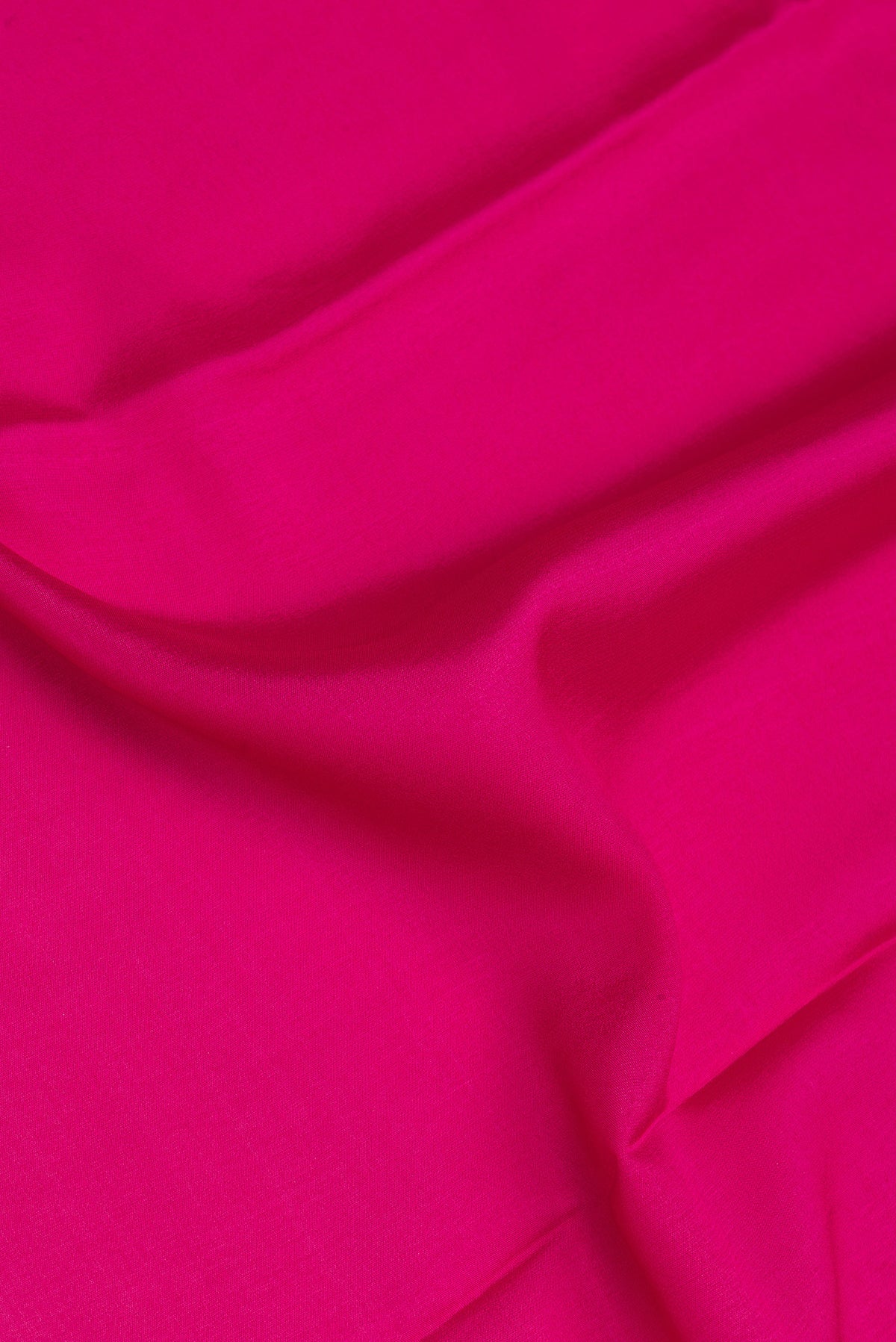Close up of Pink Mysore Silk Saree with Plain Body and Fancy Border.  displaying folds