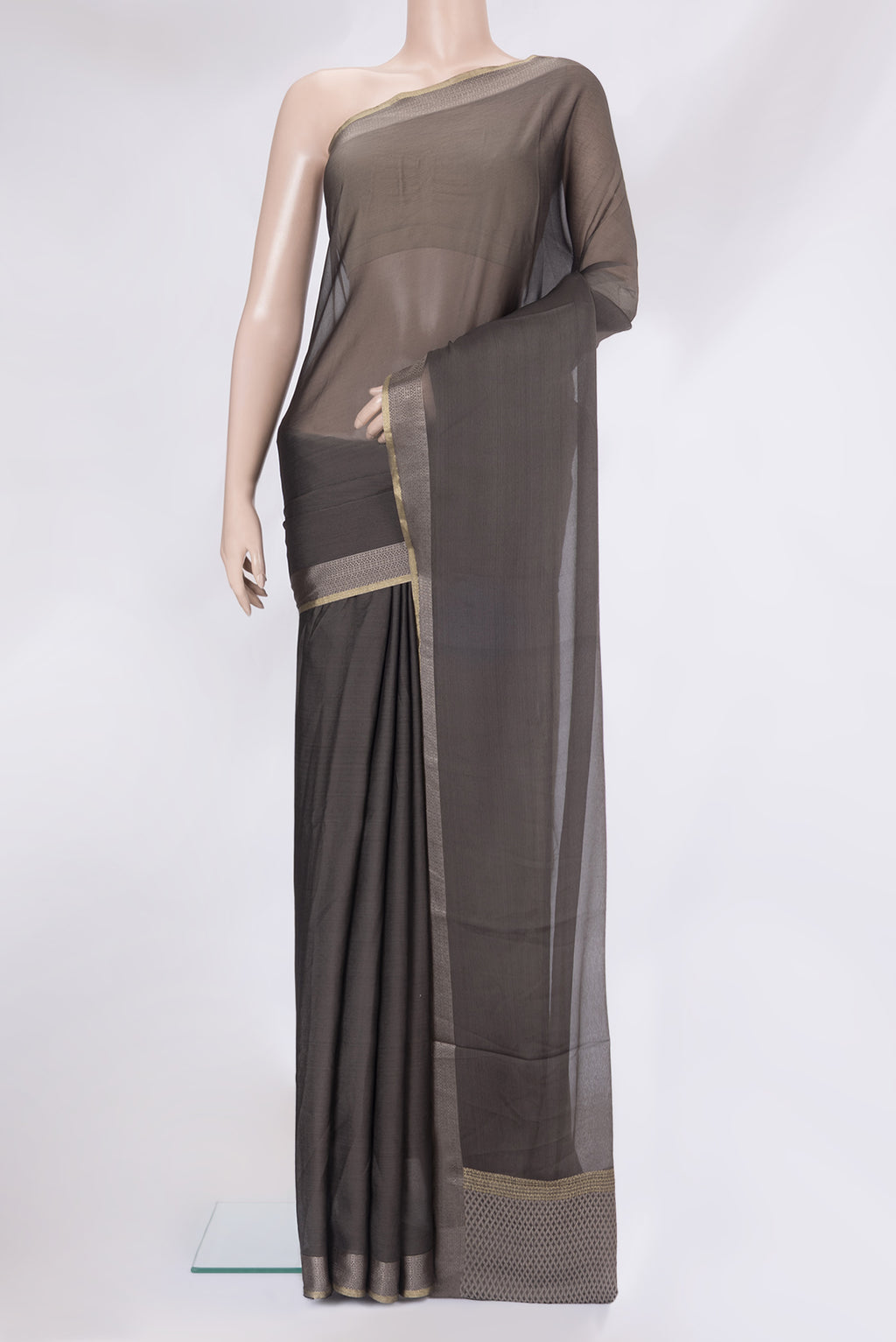 Grey Mysore Chiffon Saree with Plain Body and Zari And Thread Border.  displayed on a mannequin