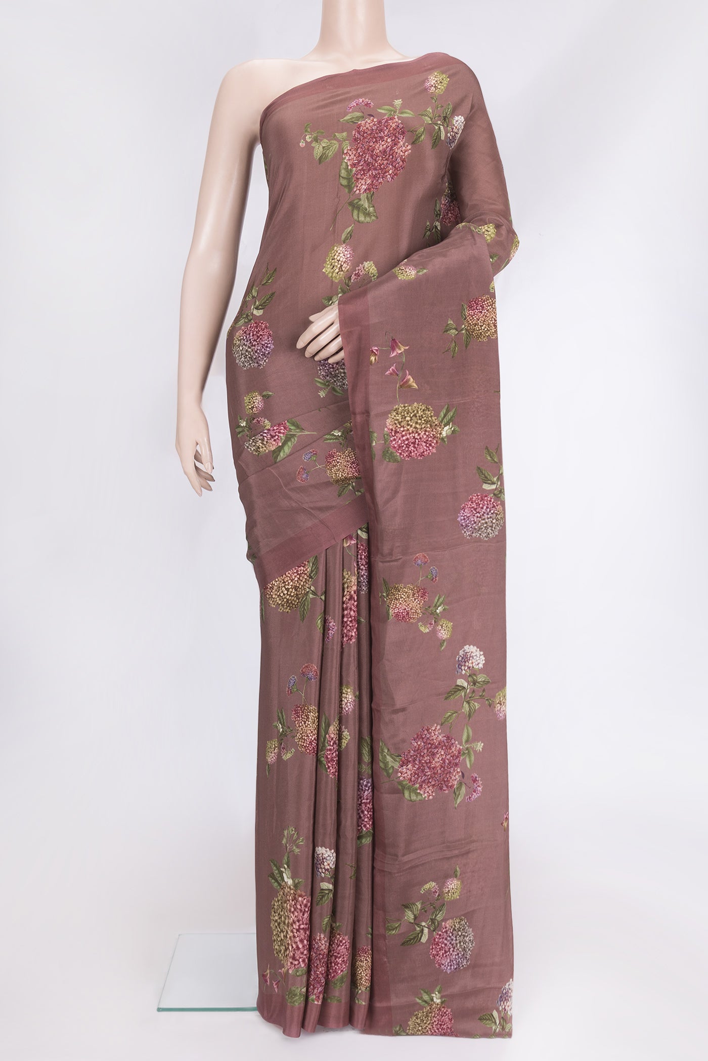 Brown Dual Tone Mysore Crepe Saree with Printed design on the body and Plain Border.  displayed on a mannequin