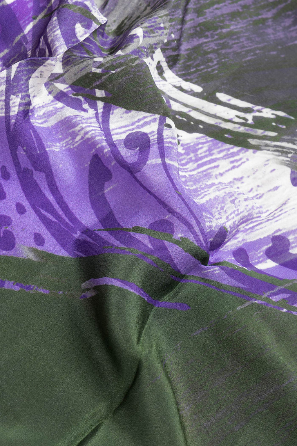 Close up of Mehandi Green Dual Tone Mysore Crepe Saree with Printed design on the body and Plain Border.  displaying folds