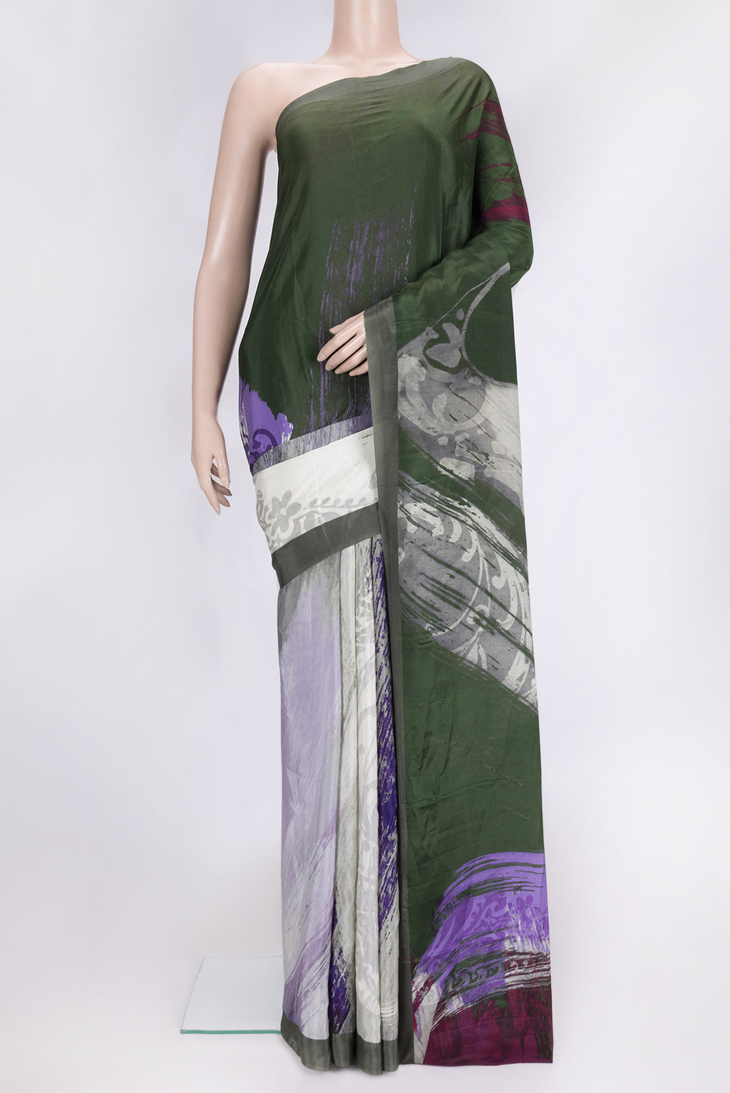 Mehandi Green Dual Tone Mysore Crepe Saree with Printed design on the body and Plain Border.  displayed on a mannequin