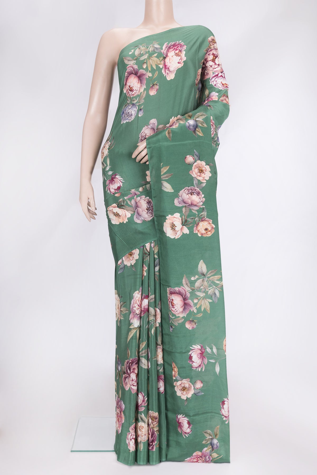 Green Dual Tone Mysore Crepe Saree with Printed design on the body and Without Border.  displayed on a mannequin