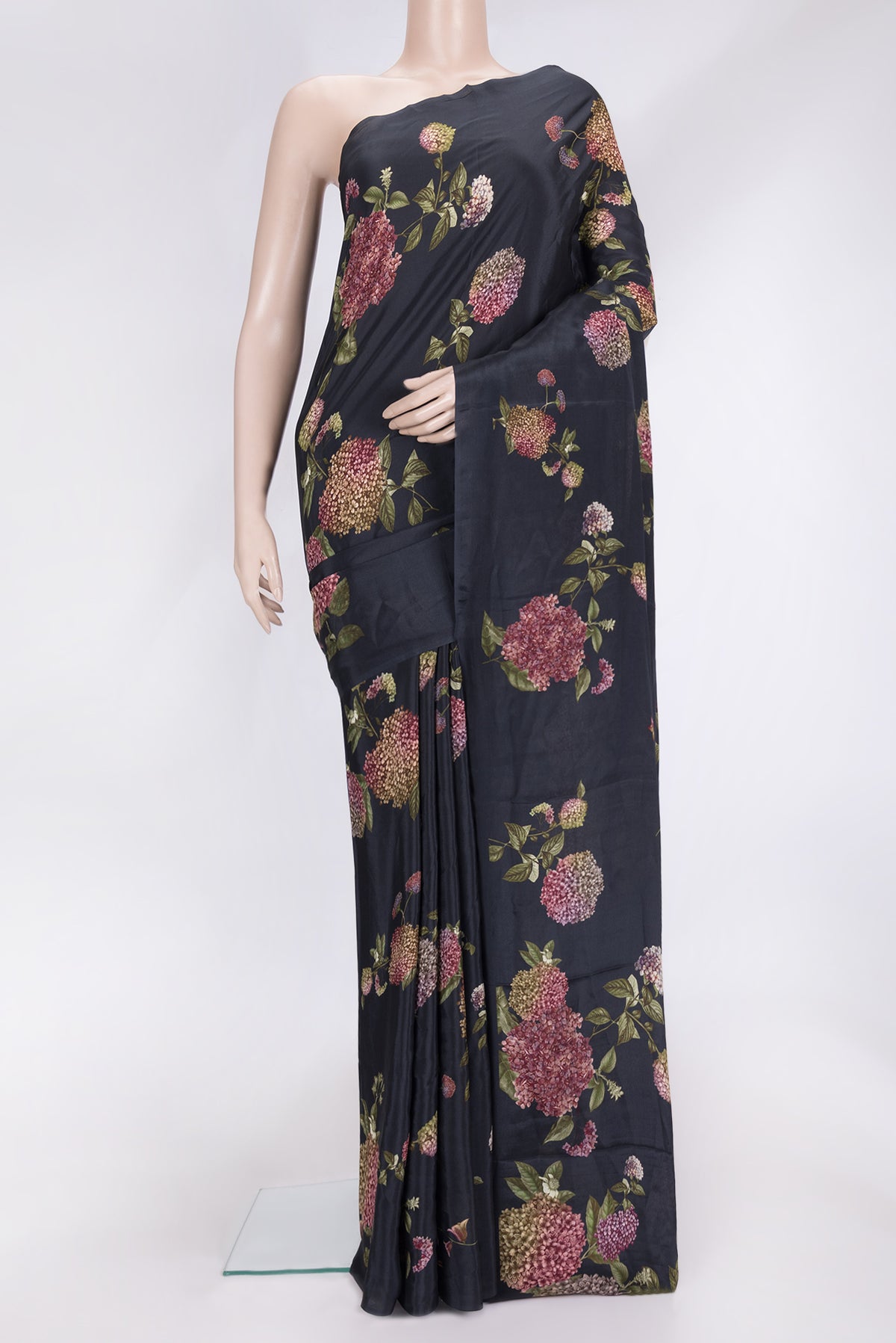 Black Dual Tone Mysore Crepe Saree with Printed design on the body and Without Border.  displayed on a mannequin