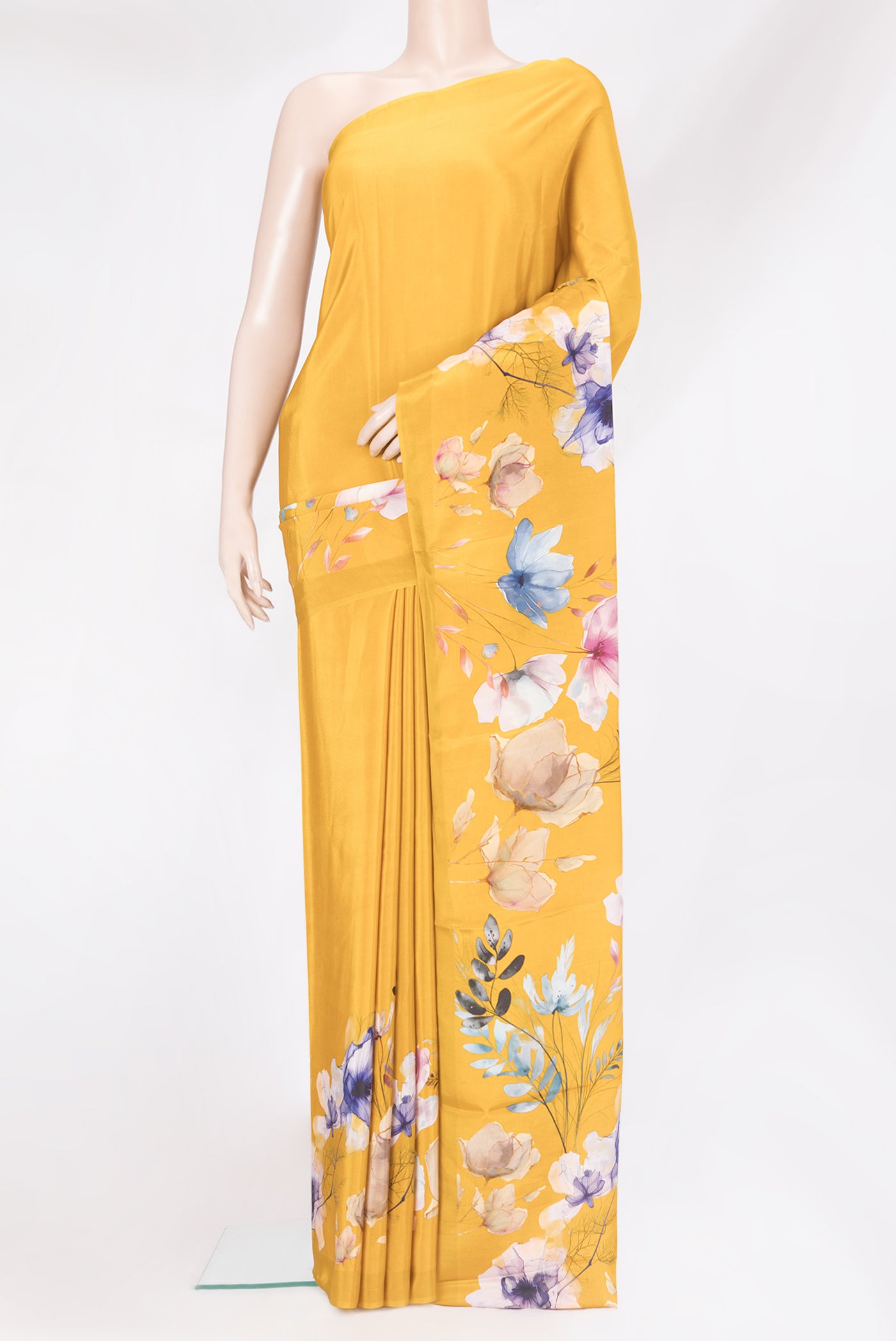 Yellow Crepe Saree with Floral Print on the body and Without Border.  displayed on a mannequin