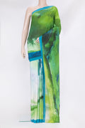 Green Crepe Saree with Printed design on the body and Plain Border.  displayed on a mannequin