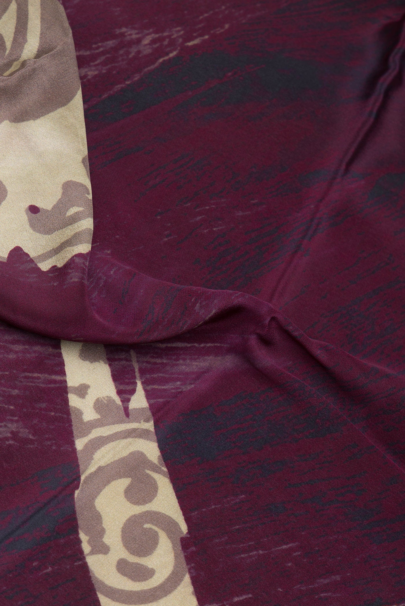 Close up of Multi Color Crepe Saree with Printed design on the body and Plain Border.  displaying folds